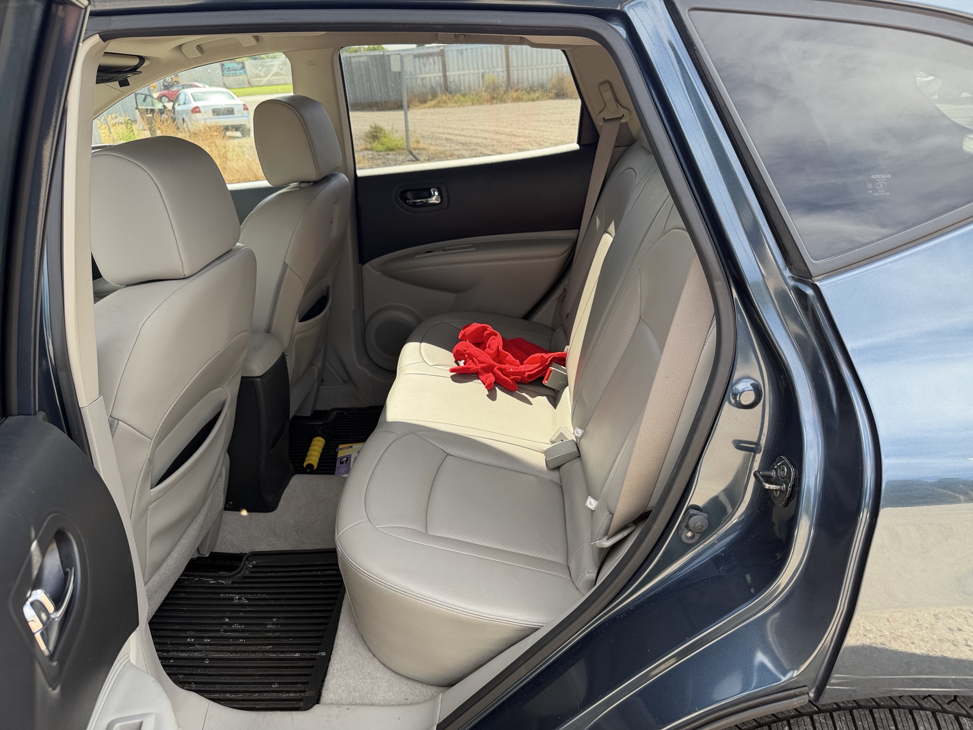 2013 nissan rogue s-awd with 108328 miles for sale near elk-river, minnesota 106488_24_drv_rear_seat.jpg