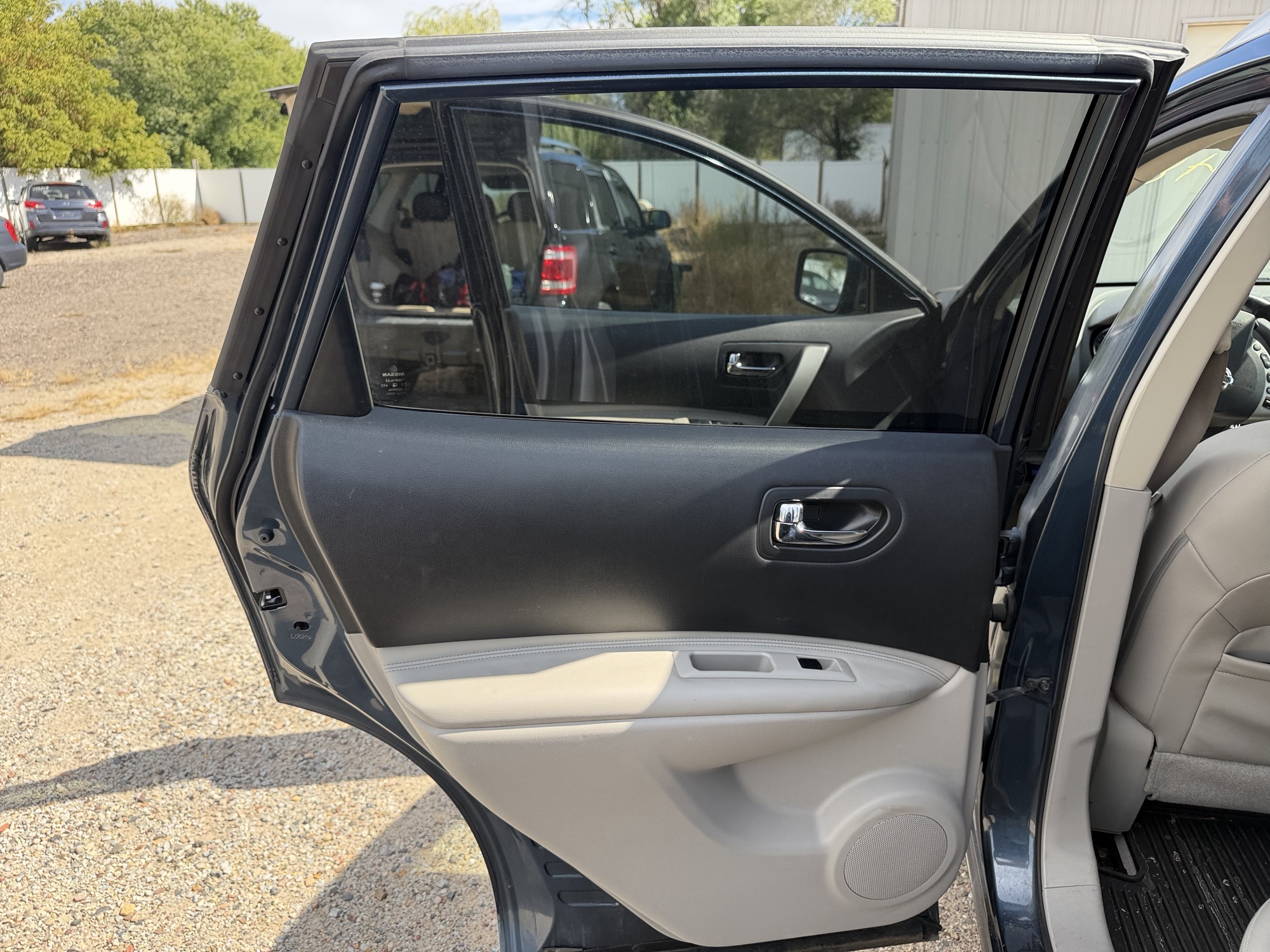 2013 nissan rogue s-awd with 108328 miles for sale near elk-river, minnesota 106488_25_drv_rear_door_panel.jpg