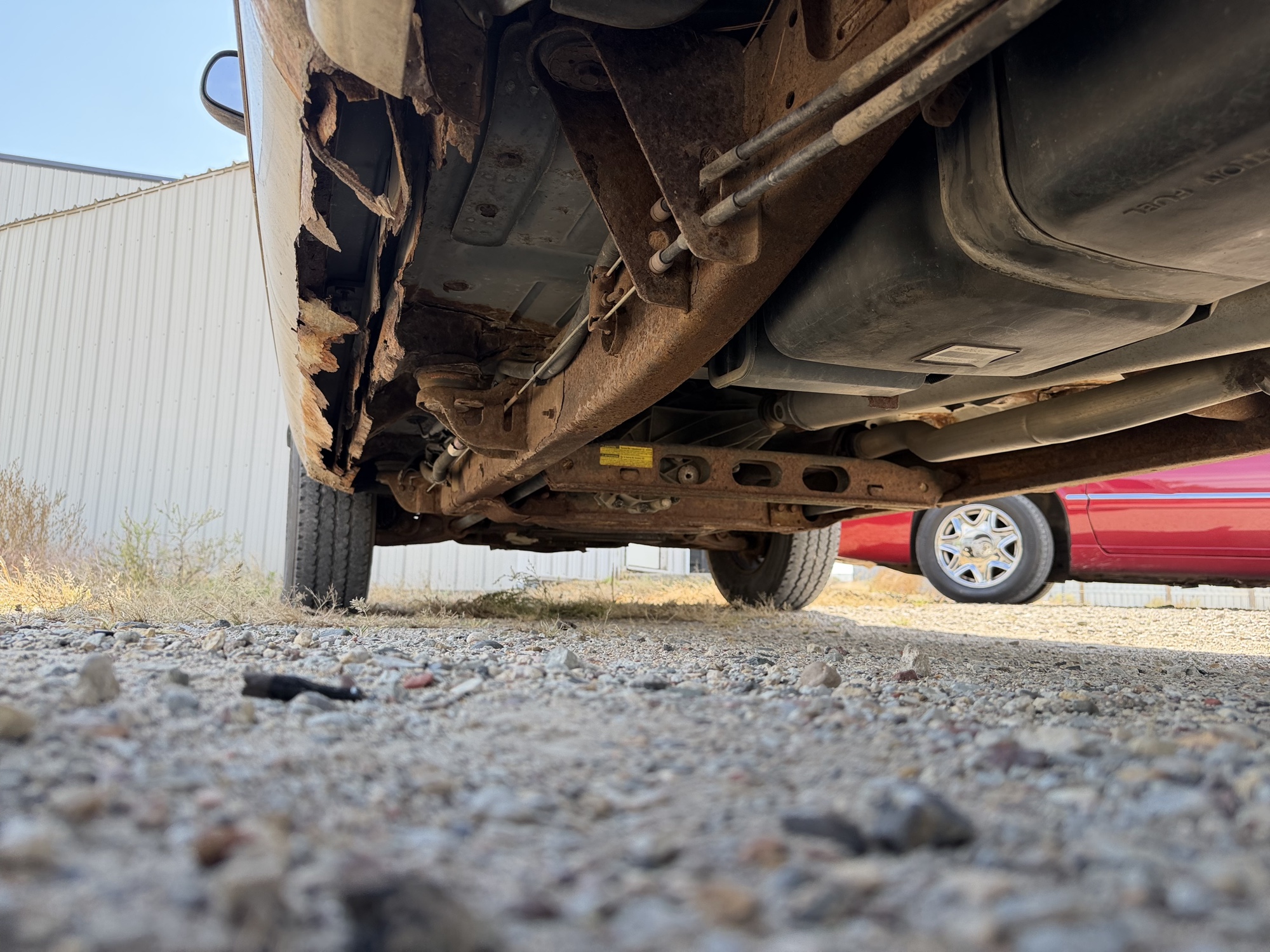 2003 chevrolet silverado-1500 ext.-cab-short-bed-4wd with 150423 miles for sale near elk-river, minnesota 106493_18_undercar_rear_drv.jpg
