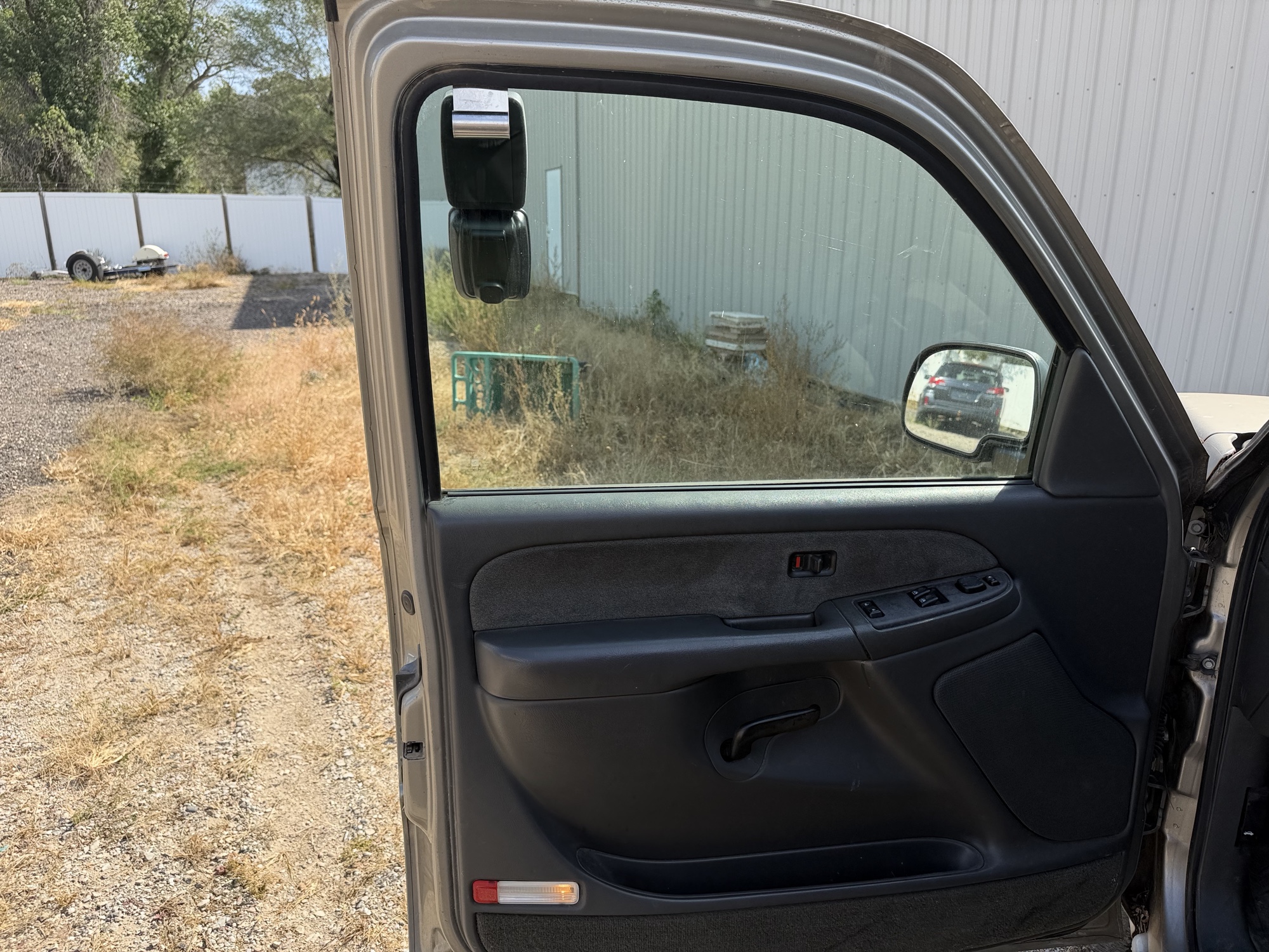 2003 chevrolet silverado-1500 ext.-cab-short-bed-4wd with 150423 miles for sale near elk-river, minnesota 106493_23_driver_door_panel.jpg