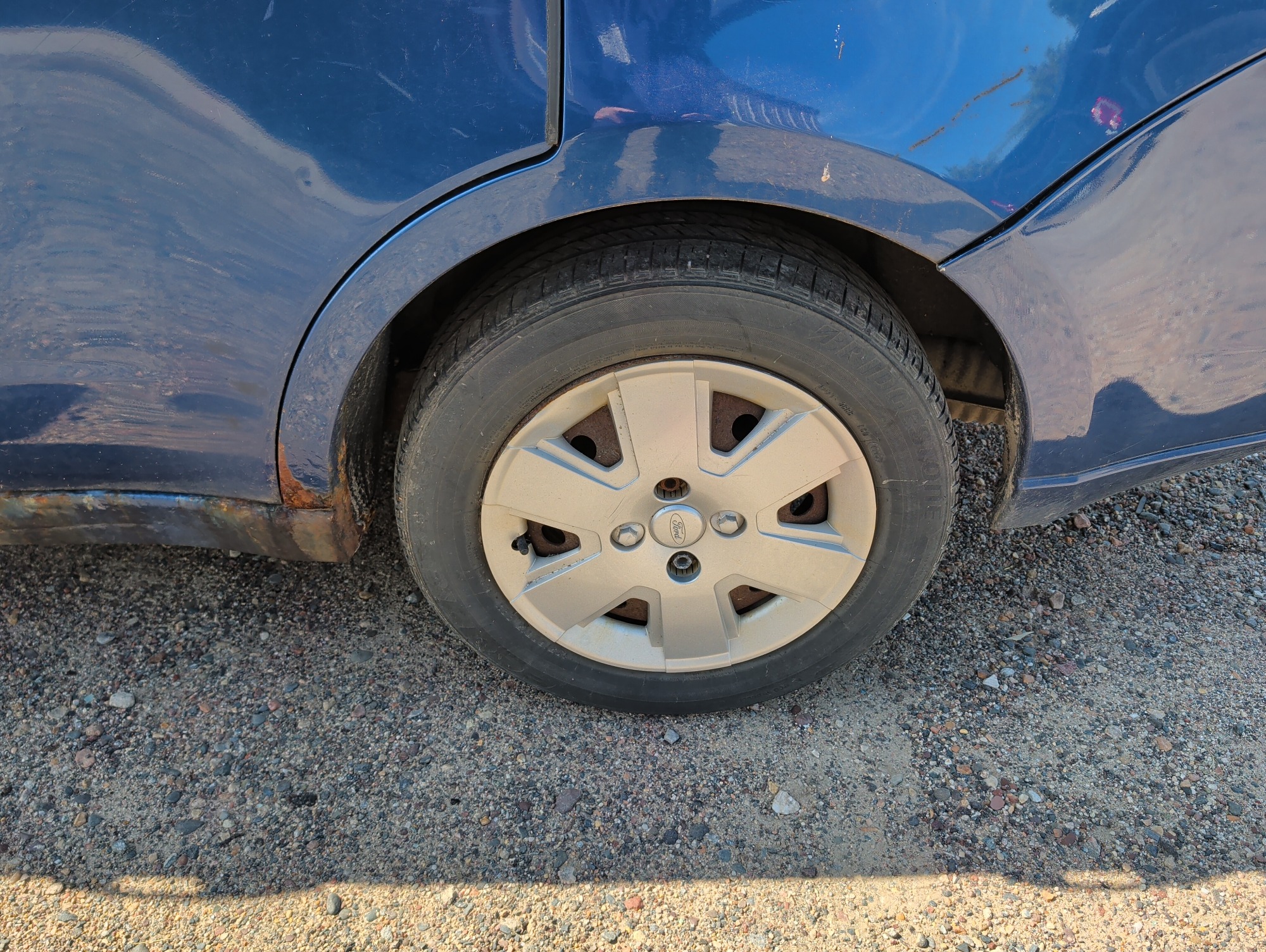 2008 ford focus se-sedan with 205187 miles for sale near elk-river, minnesota 106498_13_rear_drv_wheel.jpg