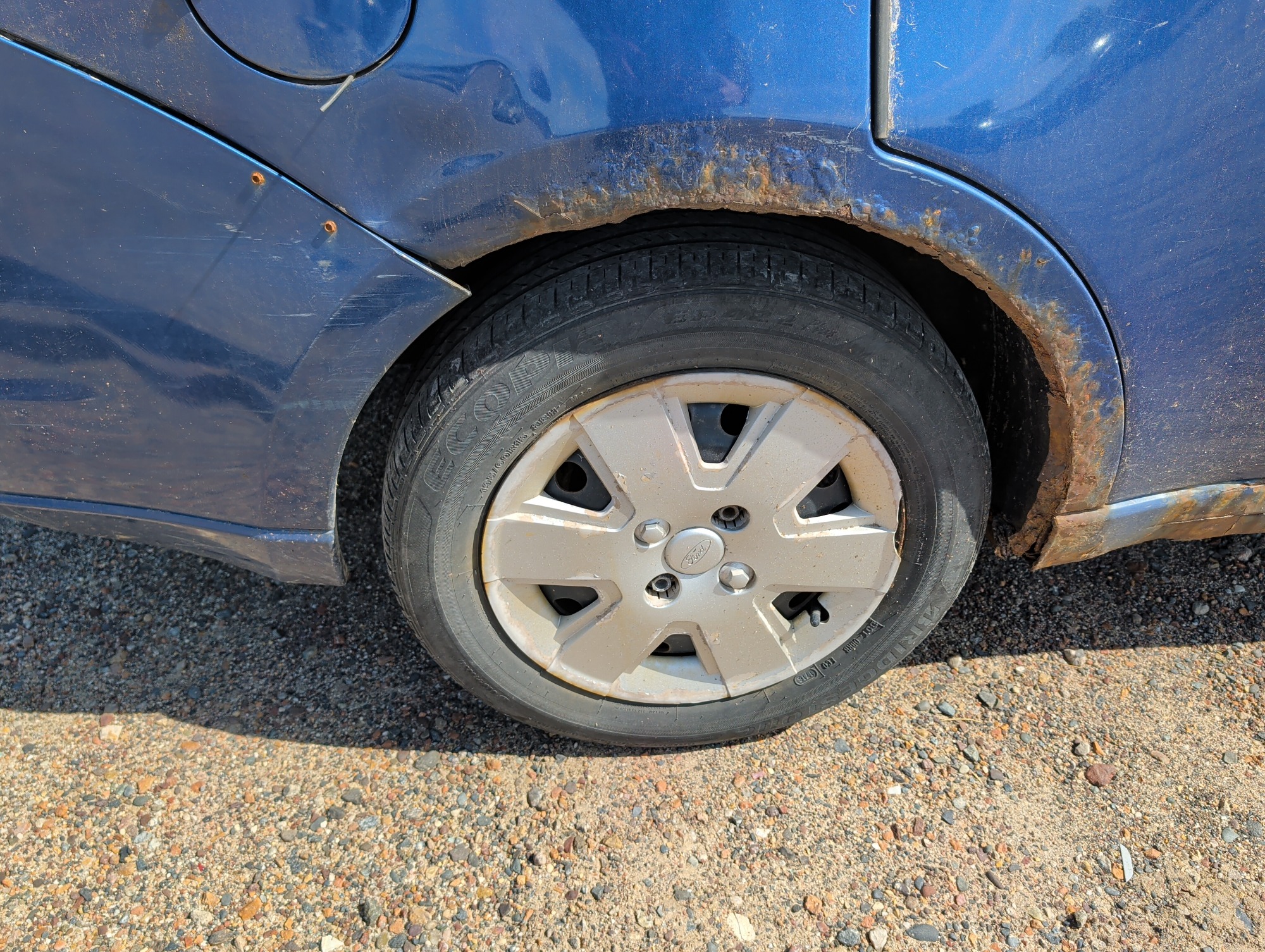 2008 ford focus se-sedan with 205187 miles for sale near elk-river, minnesota 106498_14_rear_pass_wheel.jpg