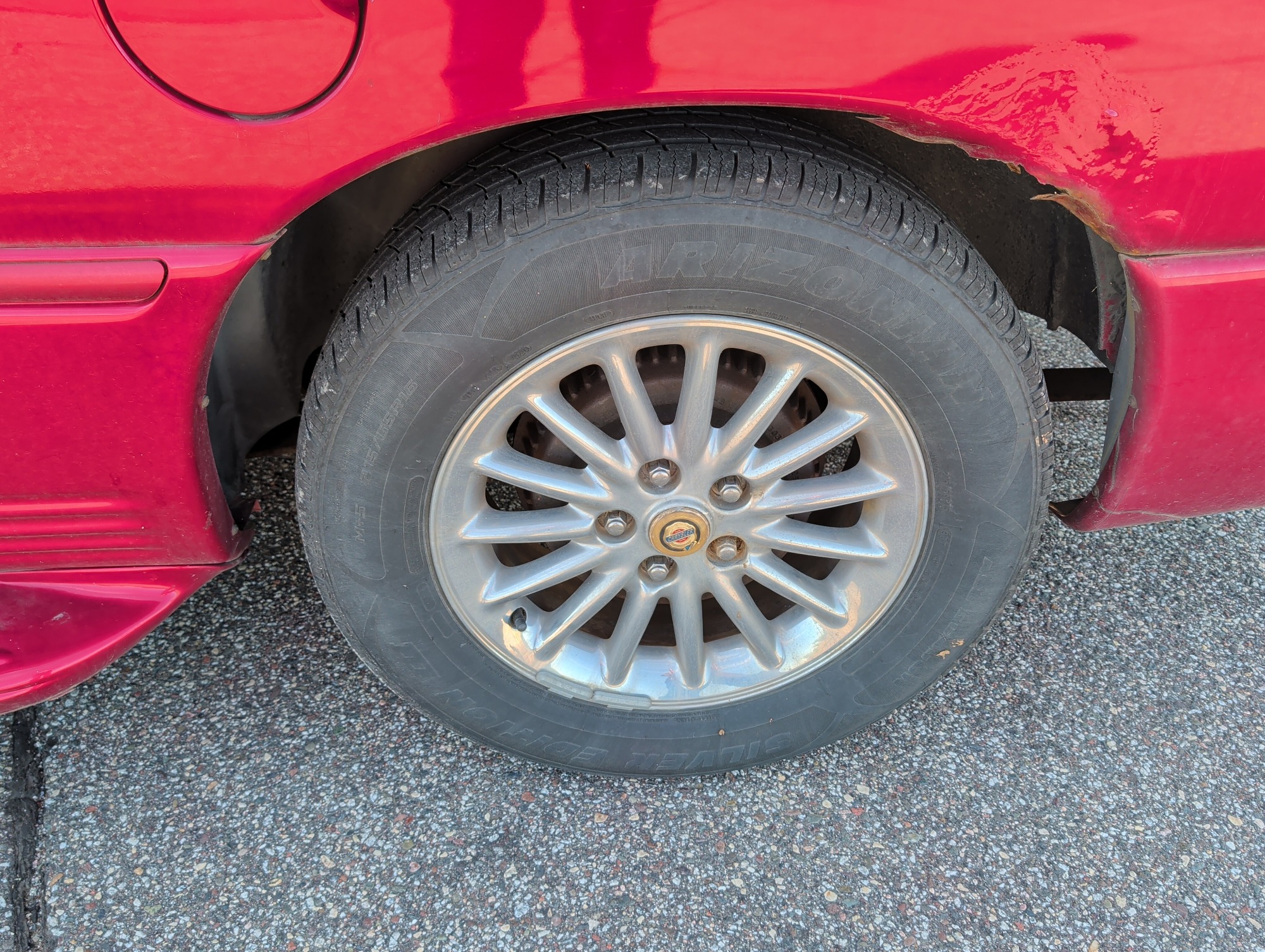 1999 chrysler town-and-country limited-fwd with 88290 miles for sale near elk-river, minnesota 106499_13_rear_drv_wheel.jpg