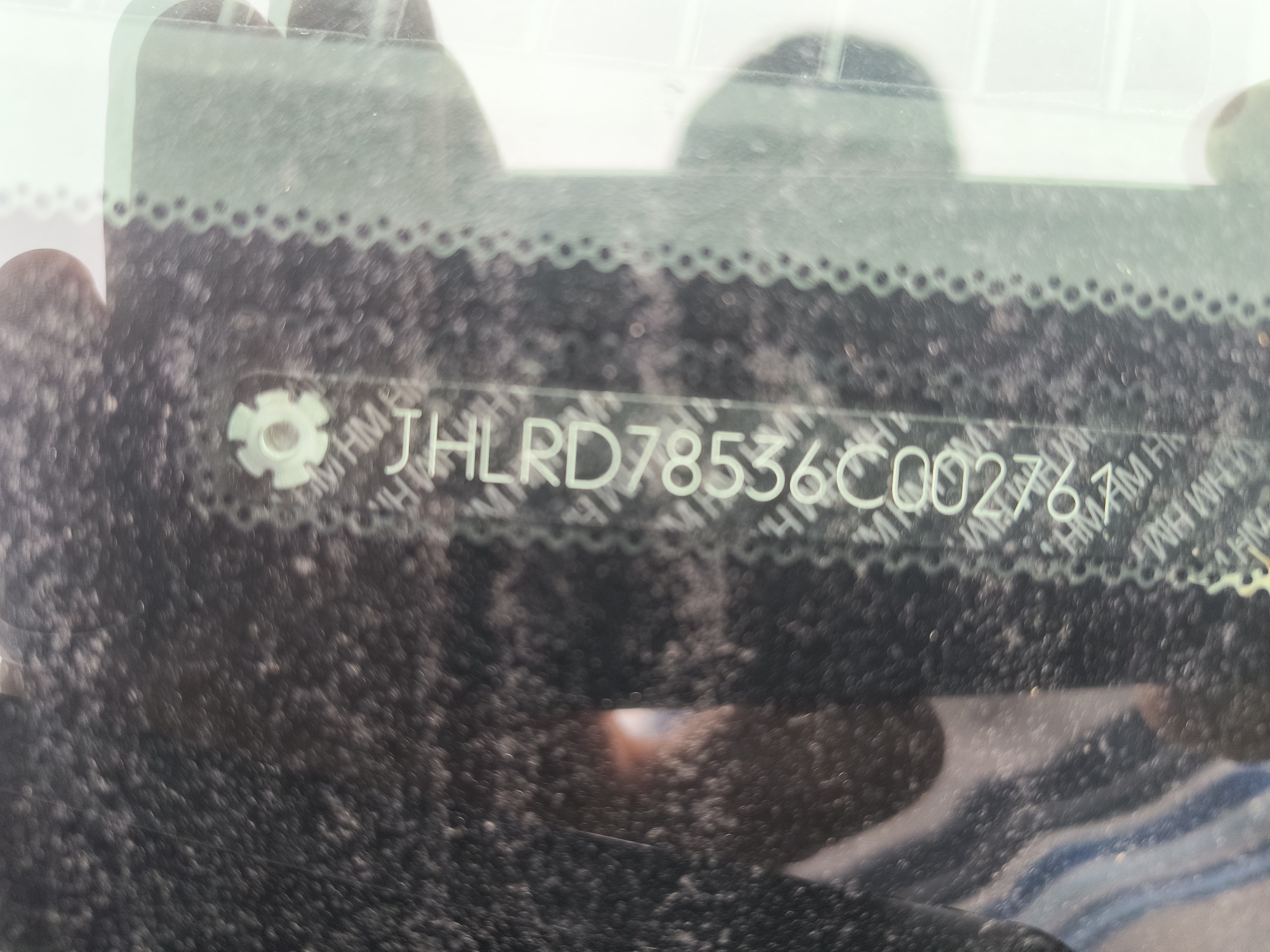 2006 honda cr-v lx-4wd-at with 127591 miles for sale near elk-river, minnesota 106500_48_windshield_vin_plate.jpg