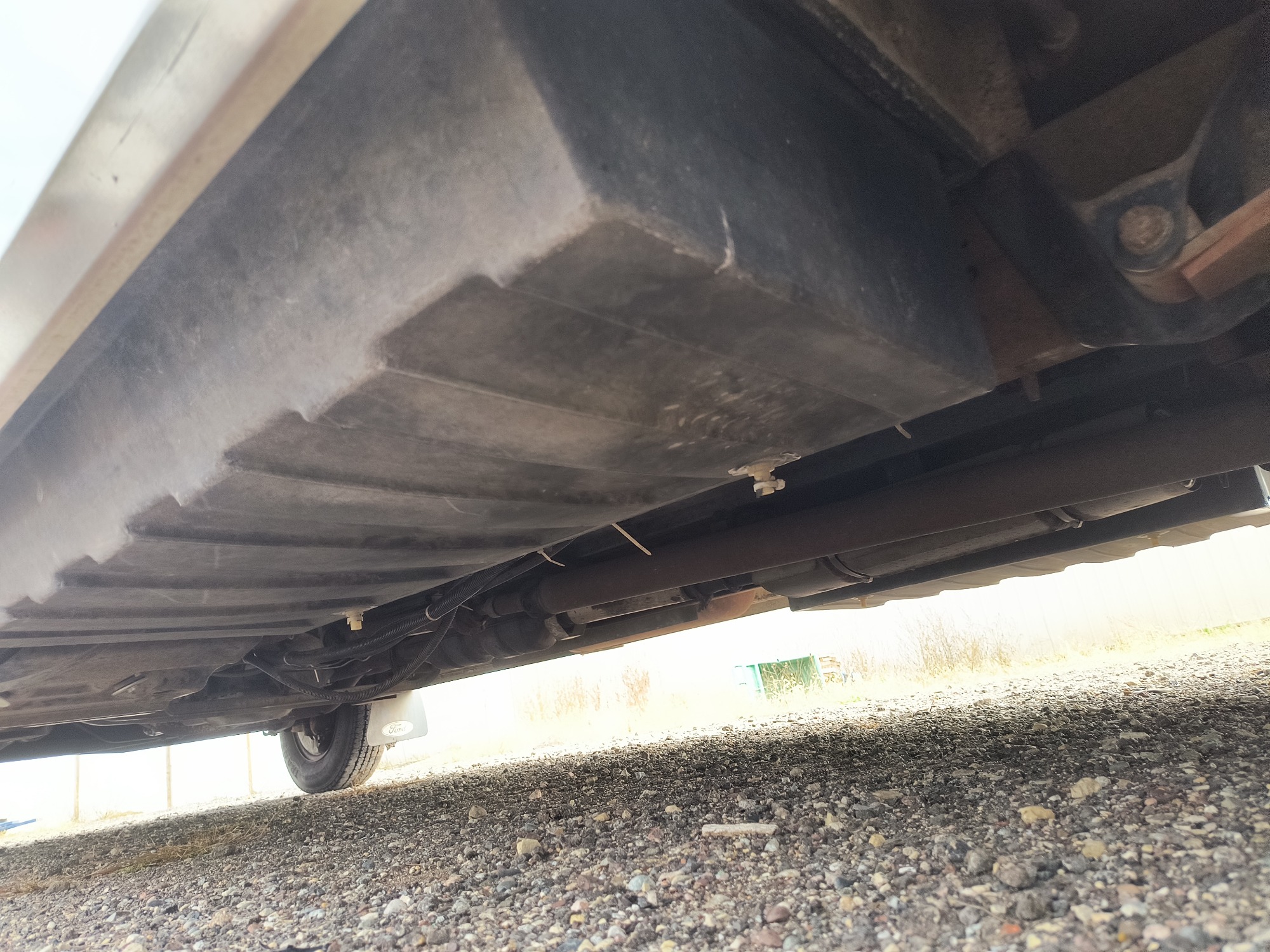 1990 ford econoline e350 with 12 miles for sale near Elk River, Minnesota 106502_18_undercar_rear_drv.jpg