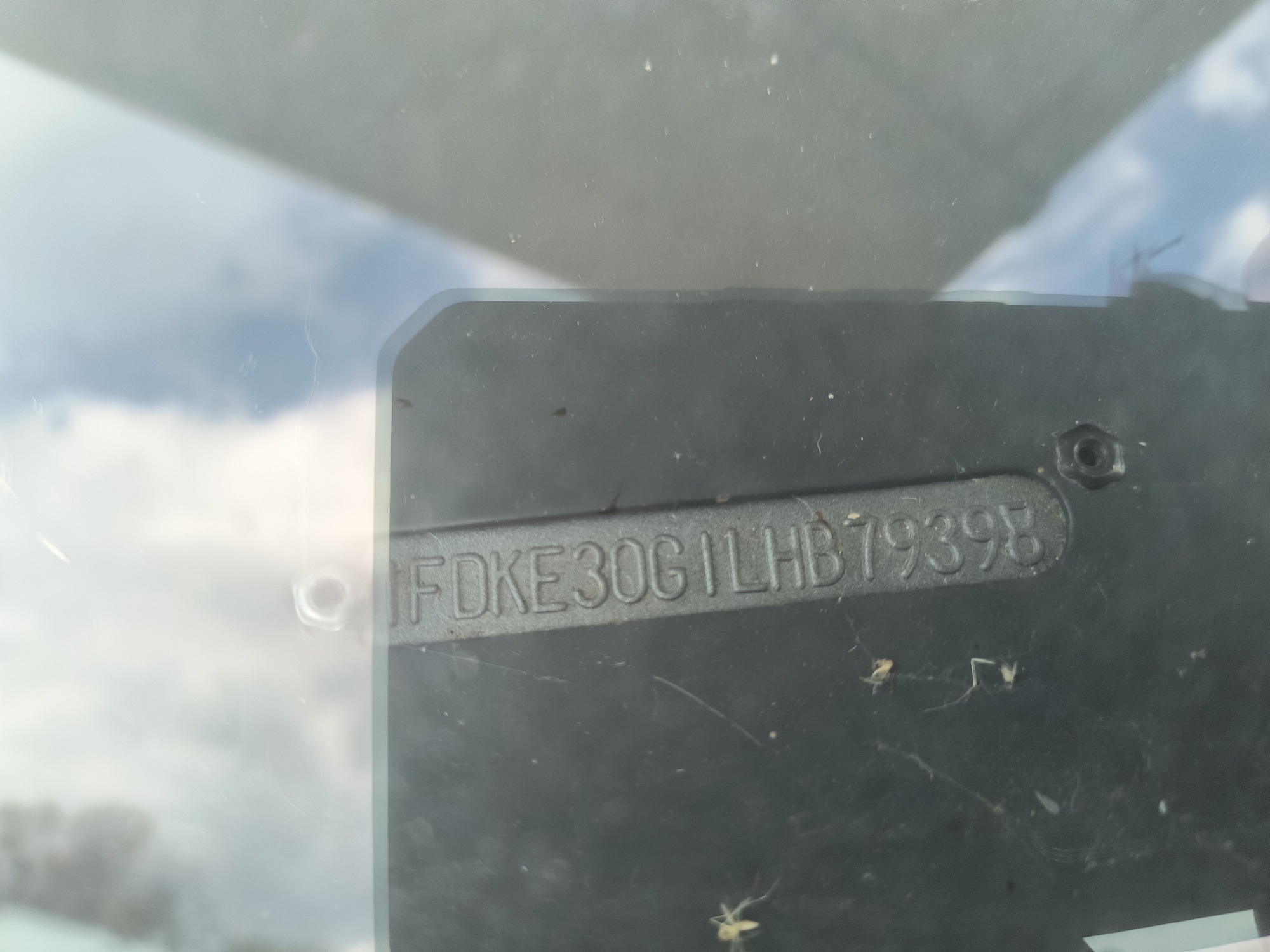 1990 ford econoline e350 with 12 miles for sale near Elk River, Minnesota 106502_48_windshield_vin_plate.jpg