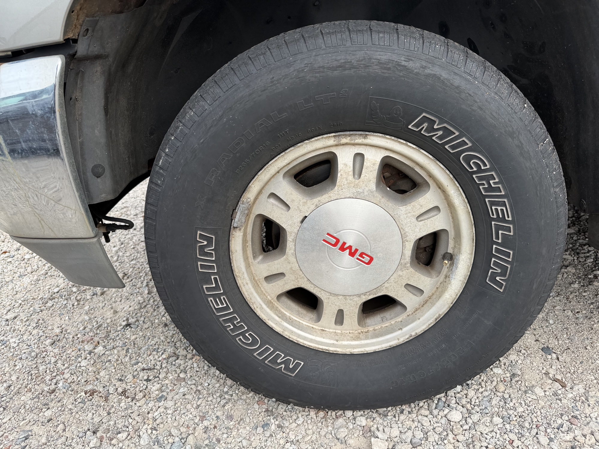 2002 gmc yukon-xl 1500-4wd with 148627 miles for sale near elk-river, minnesota 106511_12_drv_front_wheel.jpg