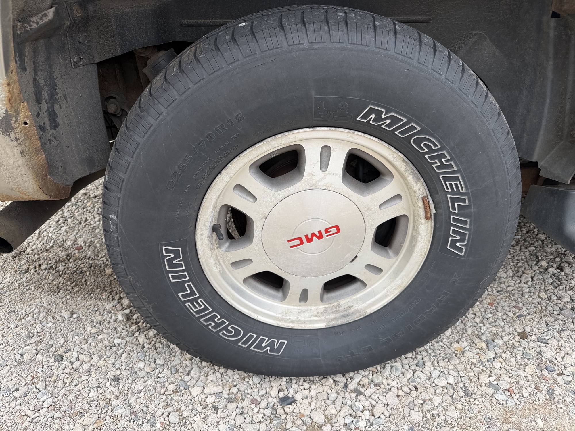 2002 gmc yukon-xl 1500-4wd with 148627 miles for sale near elk-river, minnesota 106511_14_rear_pass_wheel.jpg