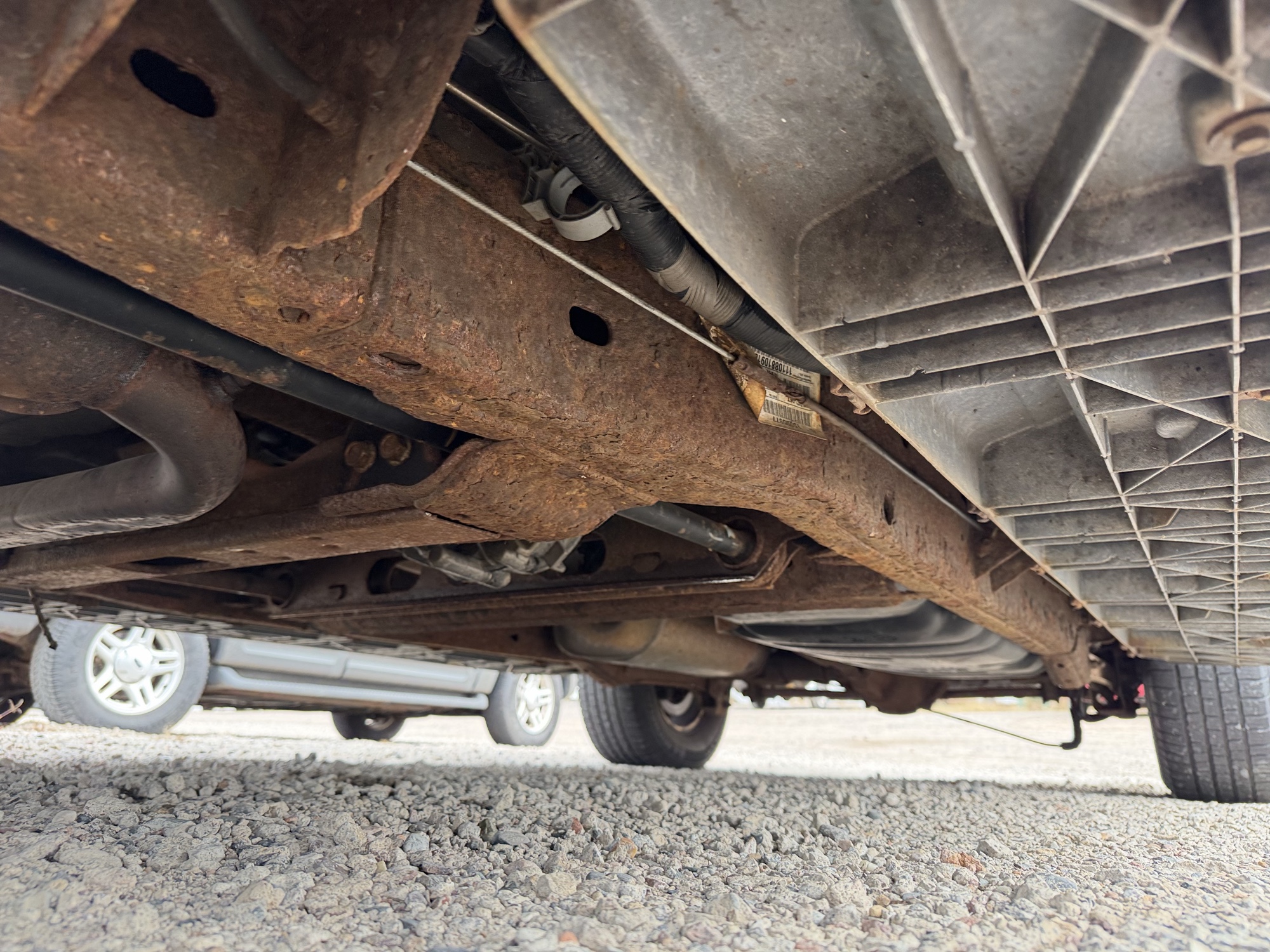 2002 gmc yukon-xl 1500-4wd with 148627 miles for sale near elk-river, minnesota 106511_17_undercar_drv_side.jpg