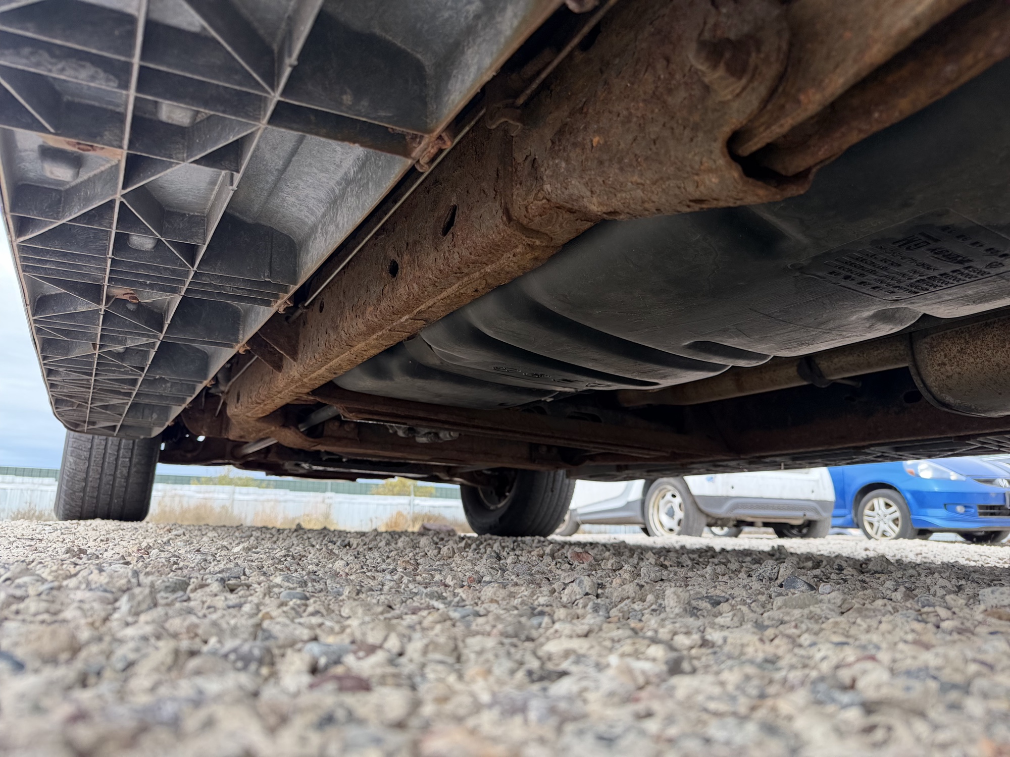 2002 gmc yukon-xl 1500-4wd with 148627 miles for sale near elk-river, minnesota 106511_18_undercar_rear_drv.jpg