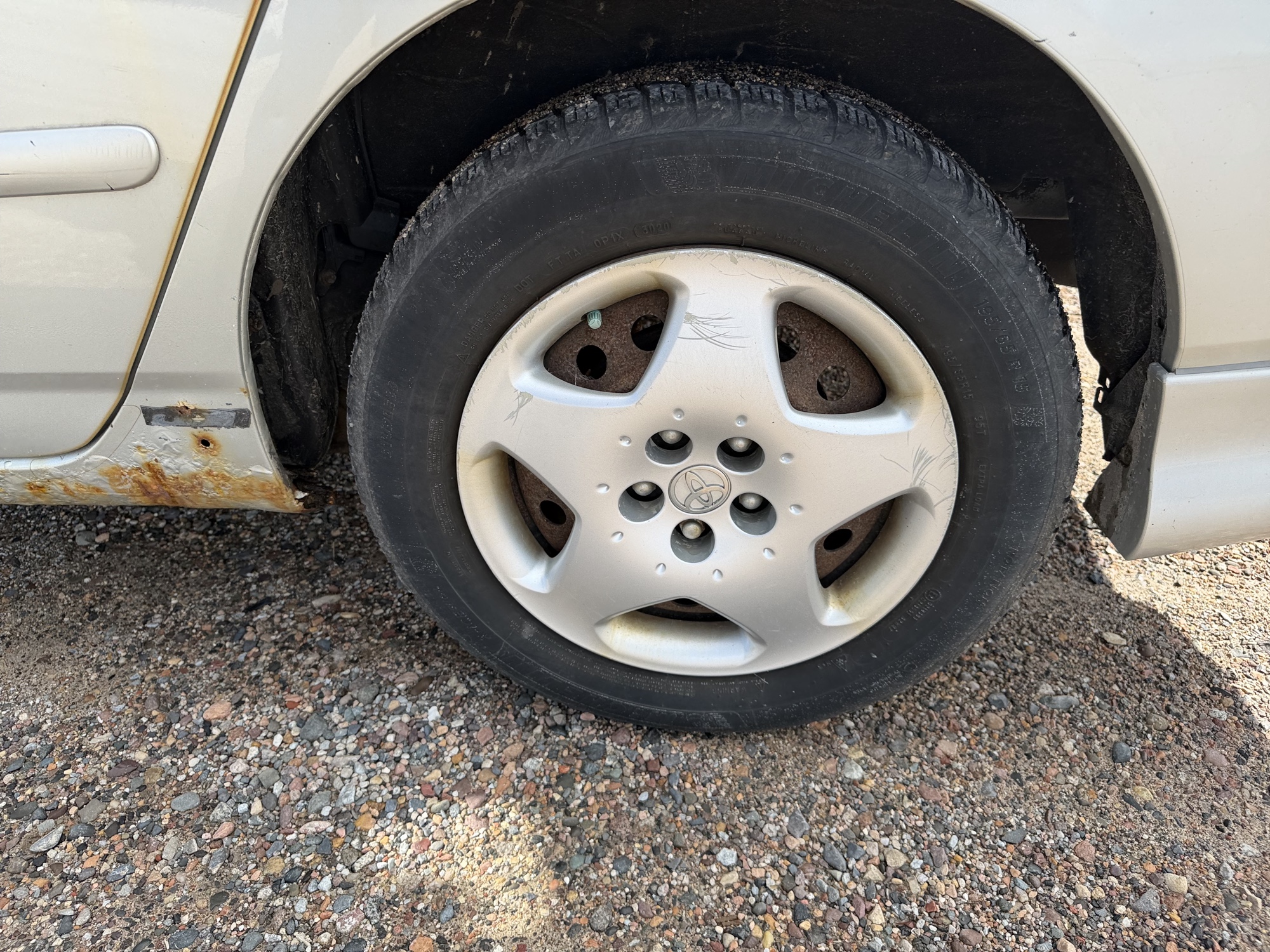 2003 toyota corolla ce with 248006 miles for sale near elk-river, minnesota 106529_13_rear_drv_wheel.jpg
