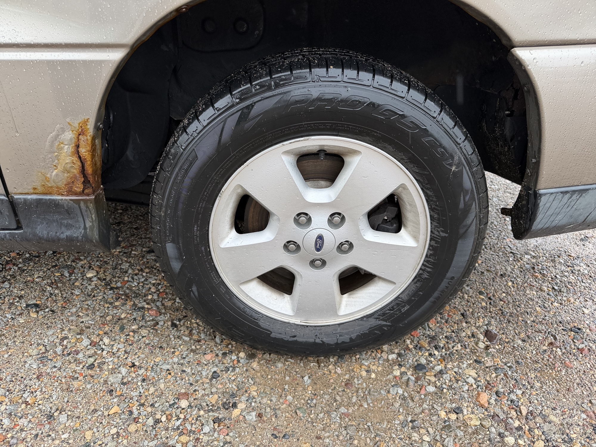 2004 ford freestar lx-sport with 163395 miles for sale near elk-river, minnesota 106532_13_rear_drv_wheel.jpg