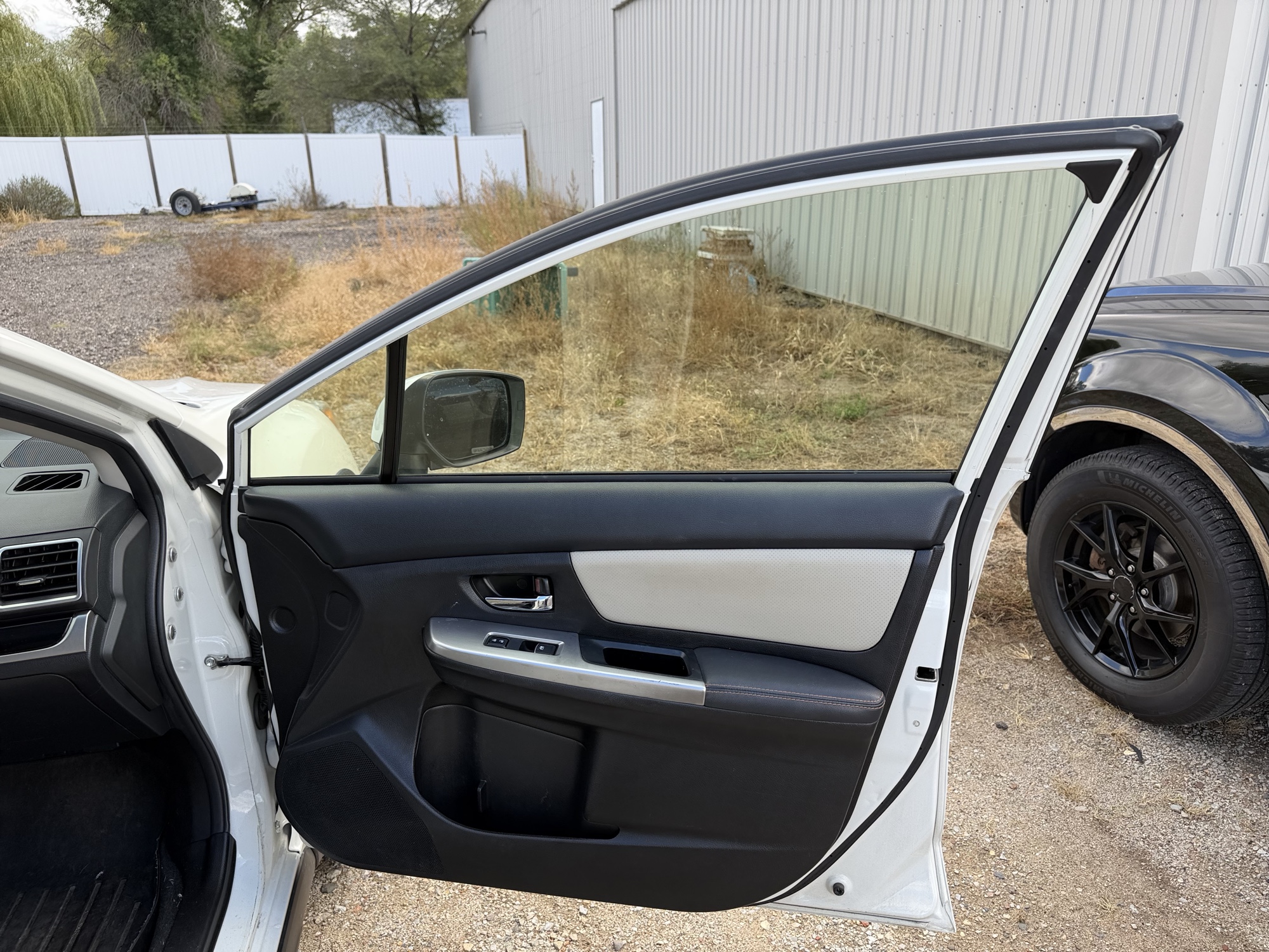 2016 subaru crosstrek 2.0i-limited-pzev-cvt with 119812 miles for sale near elk-river, minnesota 106535_32_passenger_door_panel.jpg
