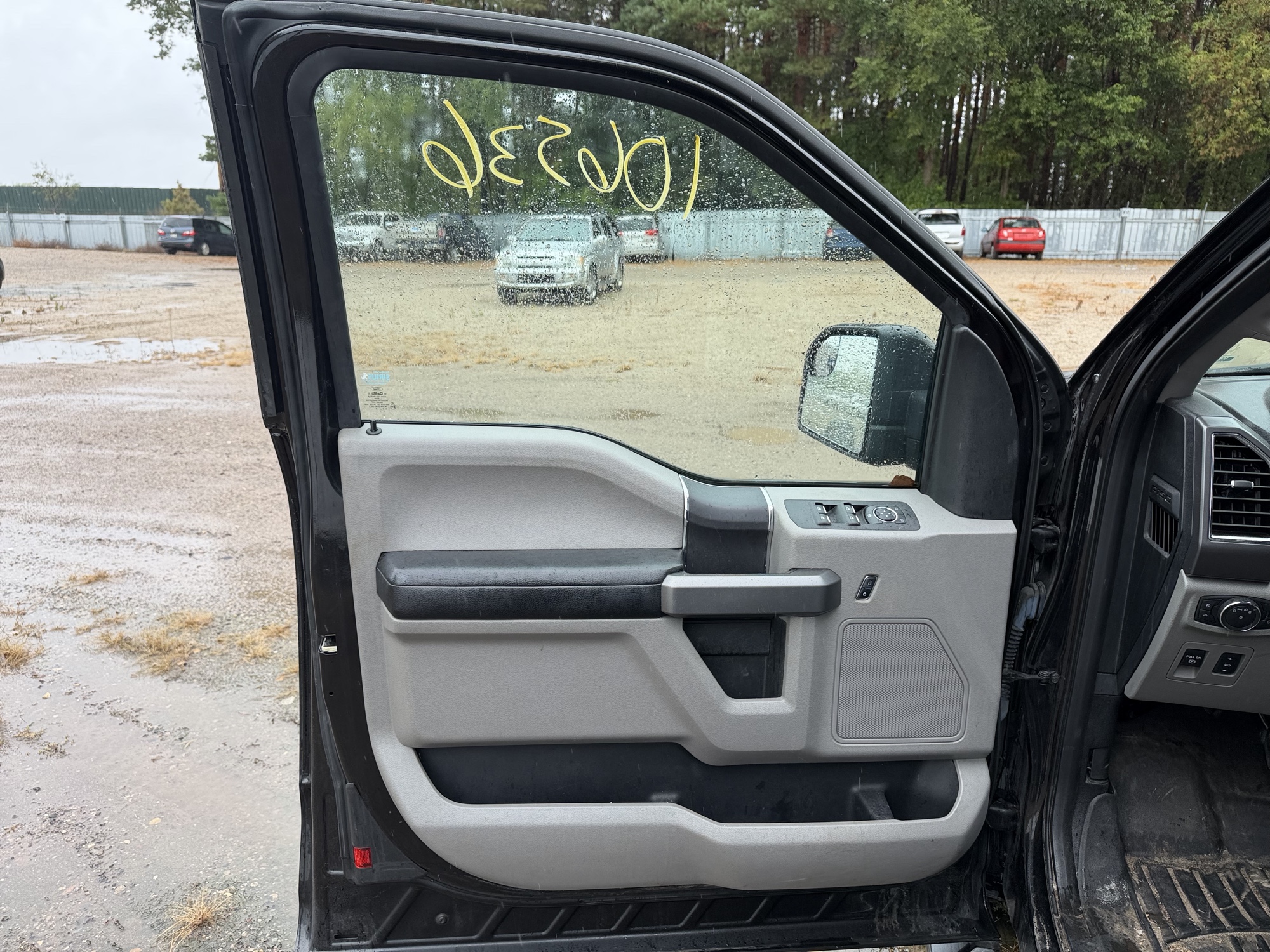 2015 ford f-150 lariat-supercab-8-ft.-4wd with 194548 miles for sale near elk-river, minnesota 106536_23_driver_door_panel.jpg