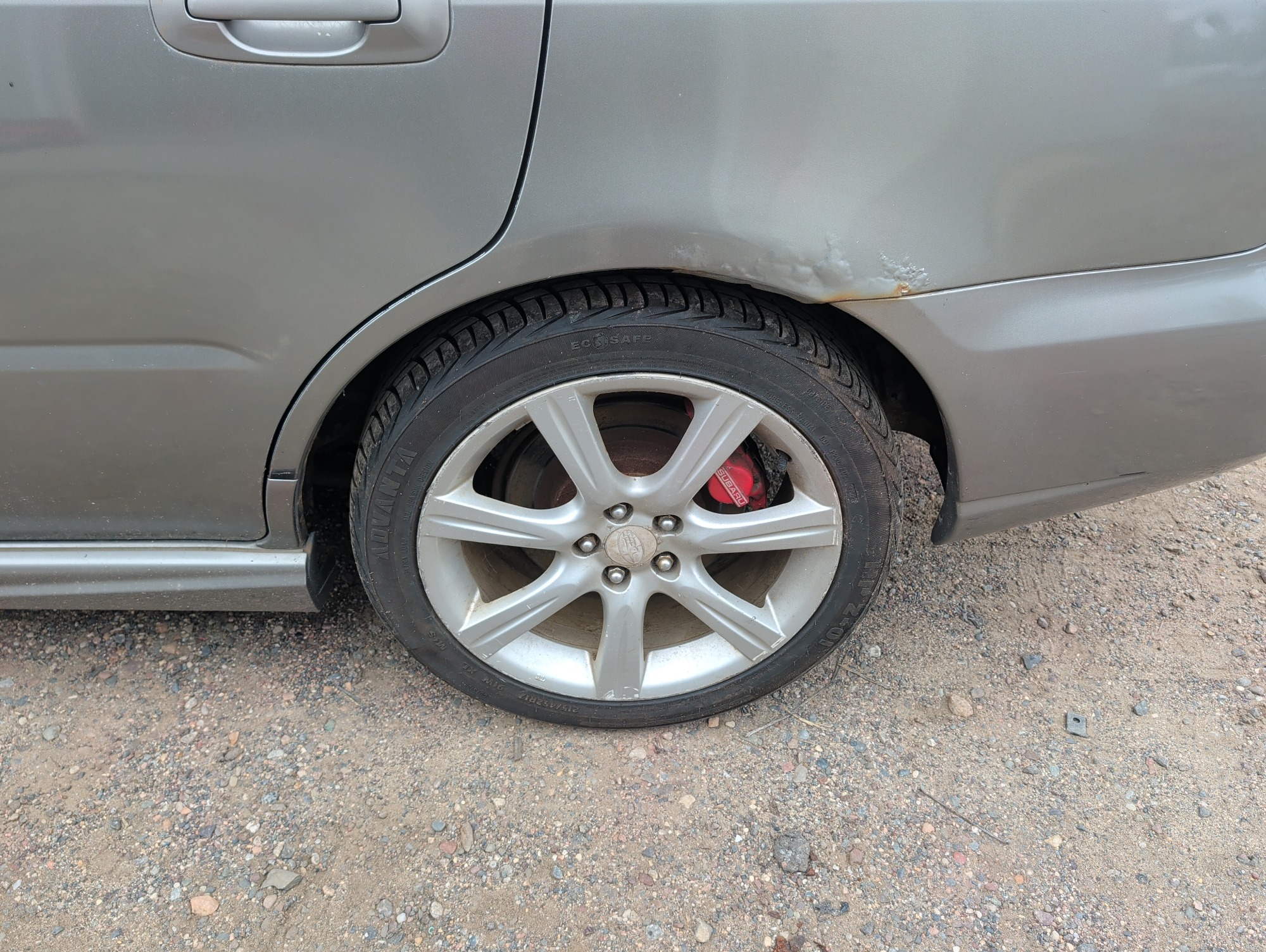 2006 subaru impreza-wagon wrx with 122069 miles for sale near elk-river, minnesota 106538_13_rear_drv_wheel.jpg