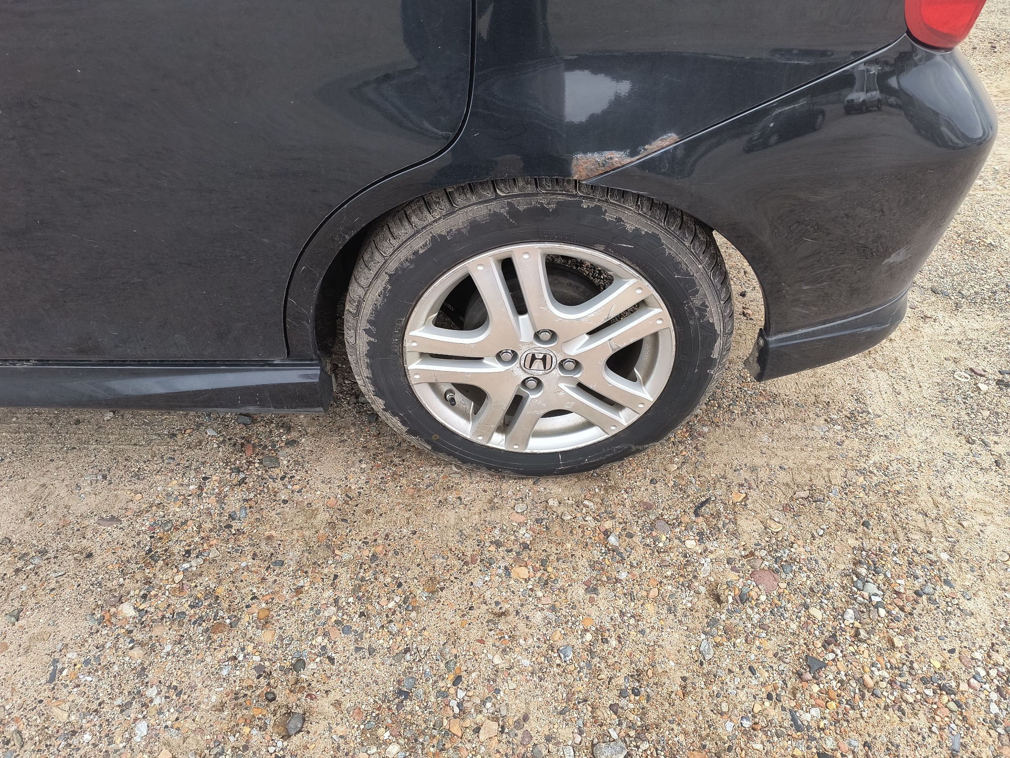 2008 honda fit sport-5-speed-at with 58667 miles for sale near elk-river, minnesota 106540_13_rear_drv_wheel.jpg