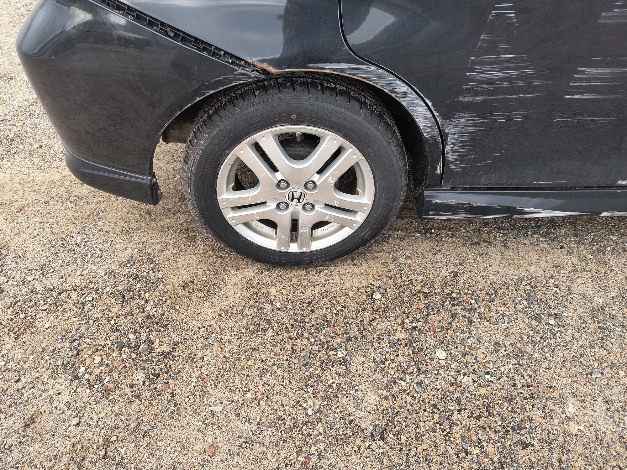 2008 honda fit sport-5-speed-at with 58667 miles for sale near elk-river, minnesota 106540_14_rear_pass_wheel.jpg