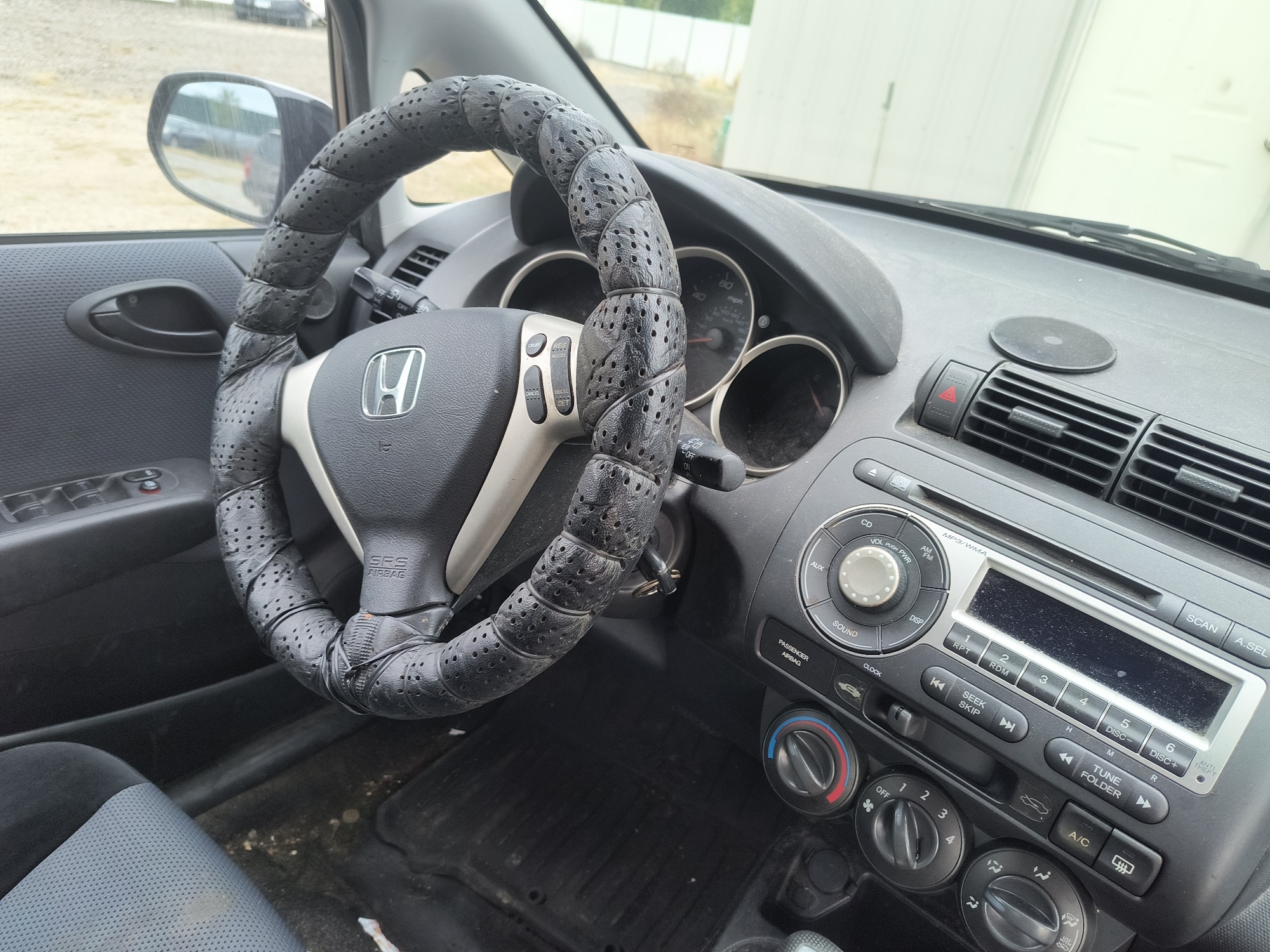 2008 honda fit sport-5-speed-at with 58667 miles for sale near elk-river, minnesota 106540_36_steering_wheel.jpg