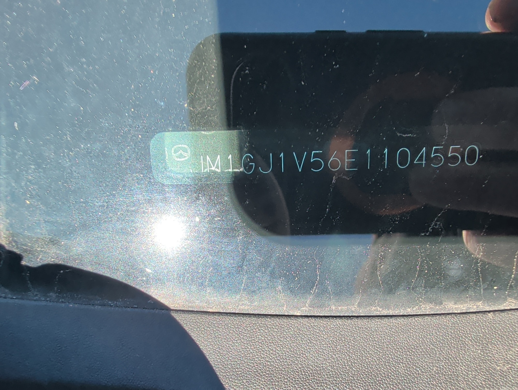 2014 mazda mazda6 i-touring-plus with 301023 miles for sale near elk-river, minnesota 106552_48_windshield_vin_plate.jpg