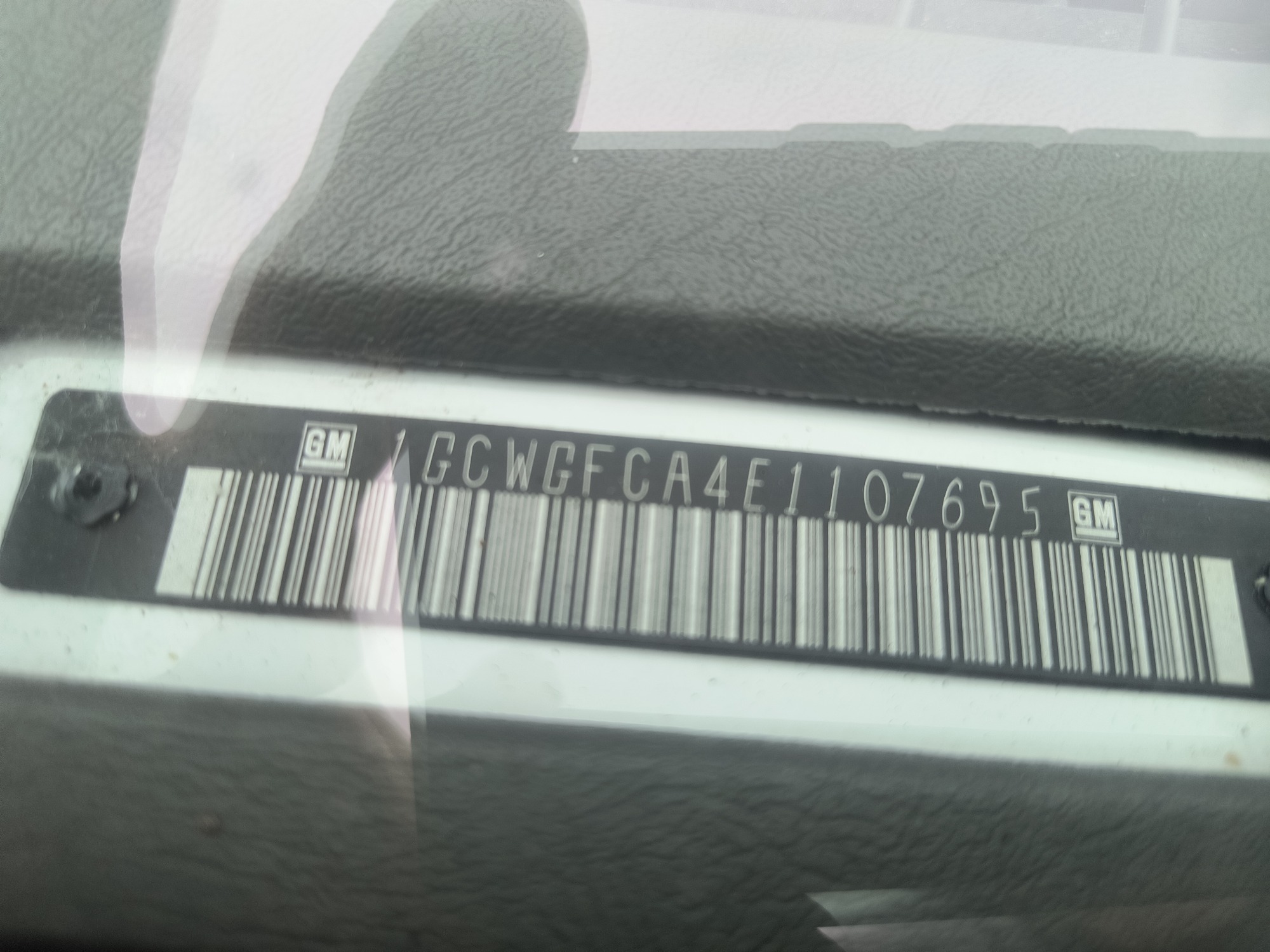 2014 chevrolet express 2500-cargo with 199160 miles for sale near elk-river, minnesota 106556_48_windshield_vin_plate.jpg