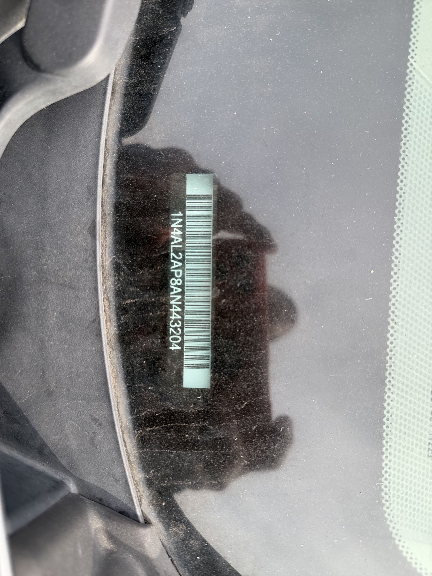 2010 nissan altima 2.5-s with 231356 miles for sale near elk-river, minnesota 106560_48_windshield_vin_plate.jpg
