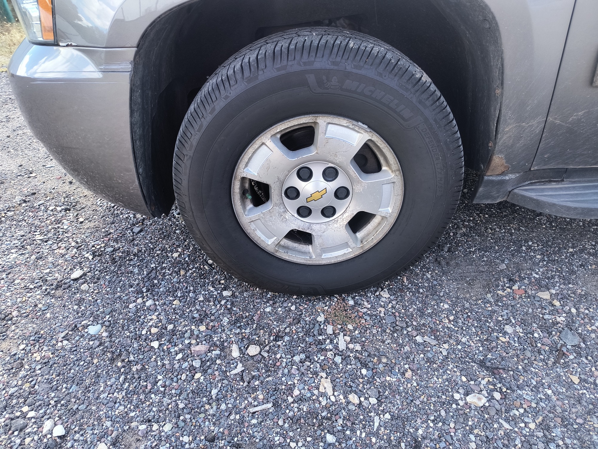 2013 chevrolet suburban ltz-1500-4wd with 215158 miles for sale near elk-river, minnesota 106563_12_drv_front_wheel.jpg