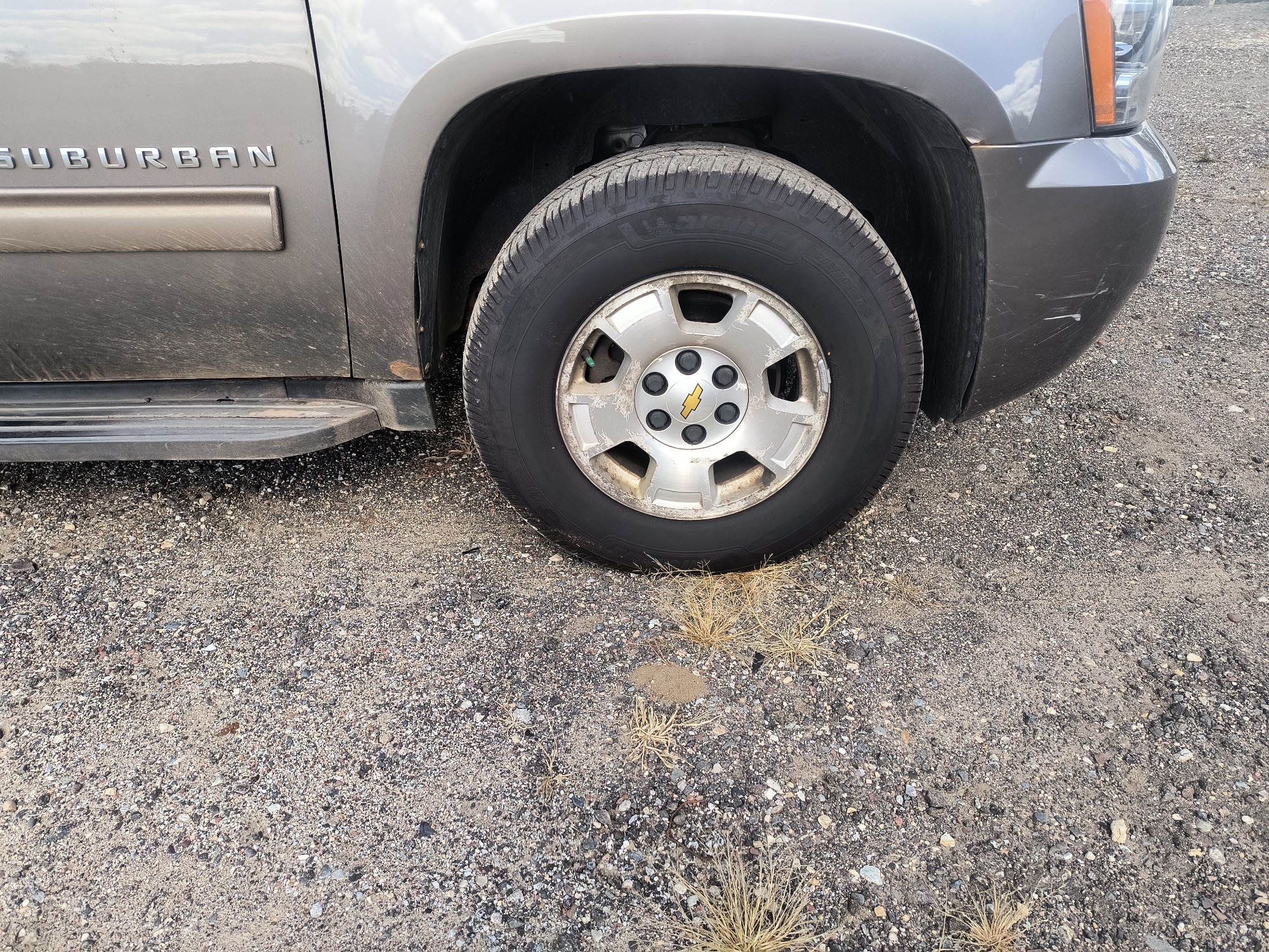 2013 chevrolet suburban ltz-1500-4wd with 215158 miles for sale near elk-river, minnesota 106563_15_front_pass_wheel.jpg