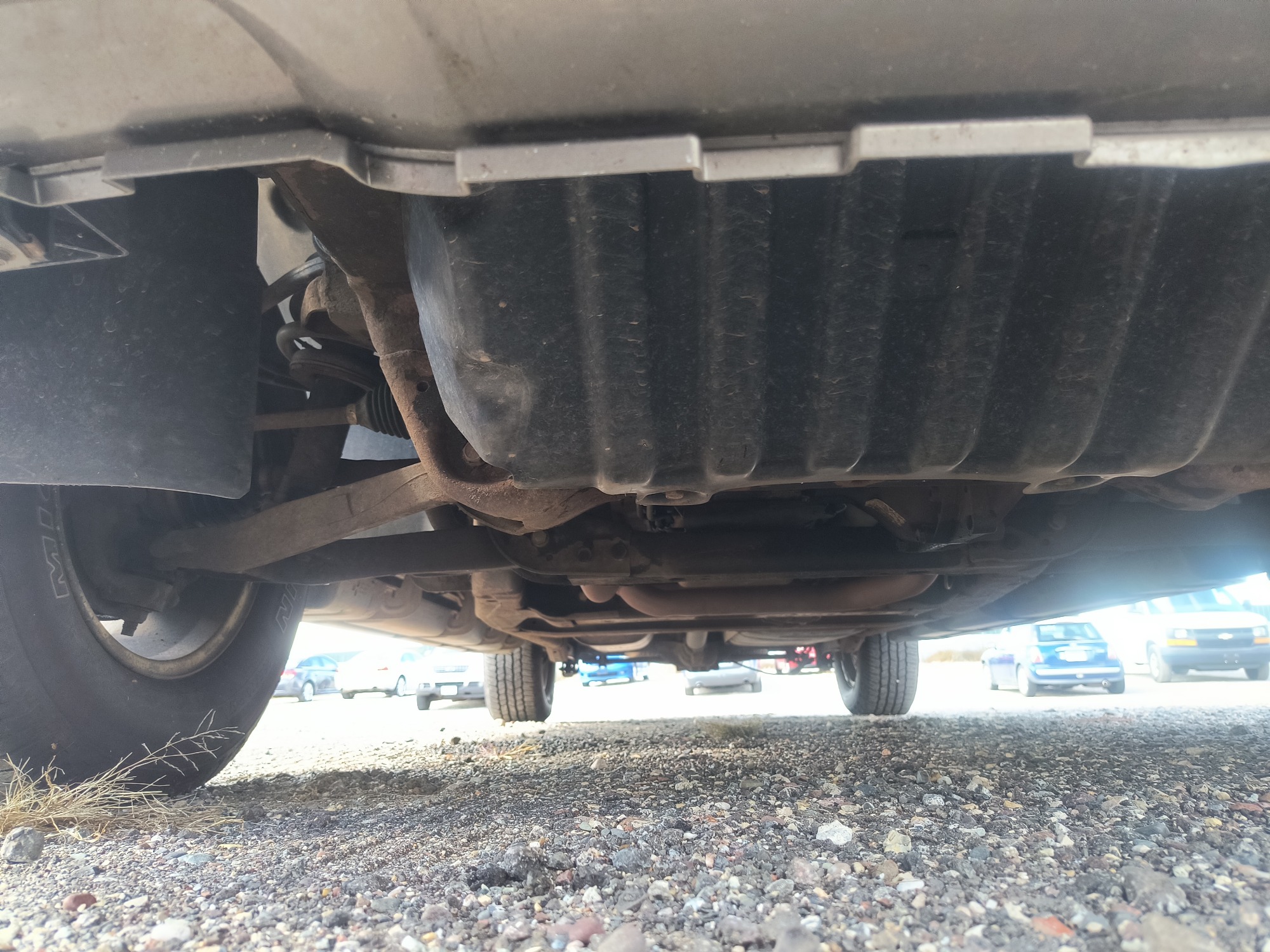 2013 chevrolet suburban ltz-1500-4wd with 215158 miles for sale near elk-river, minnesota 106563_16_undercar_front.jpg