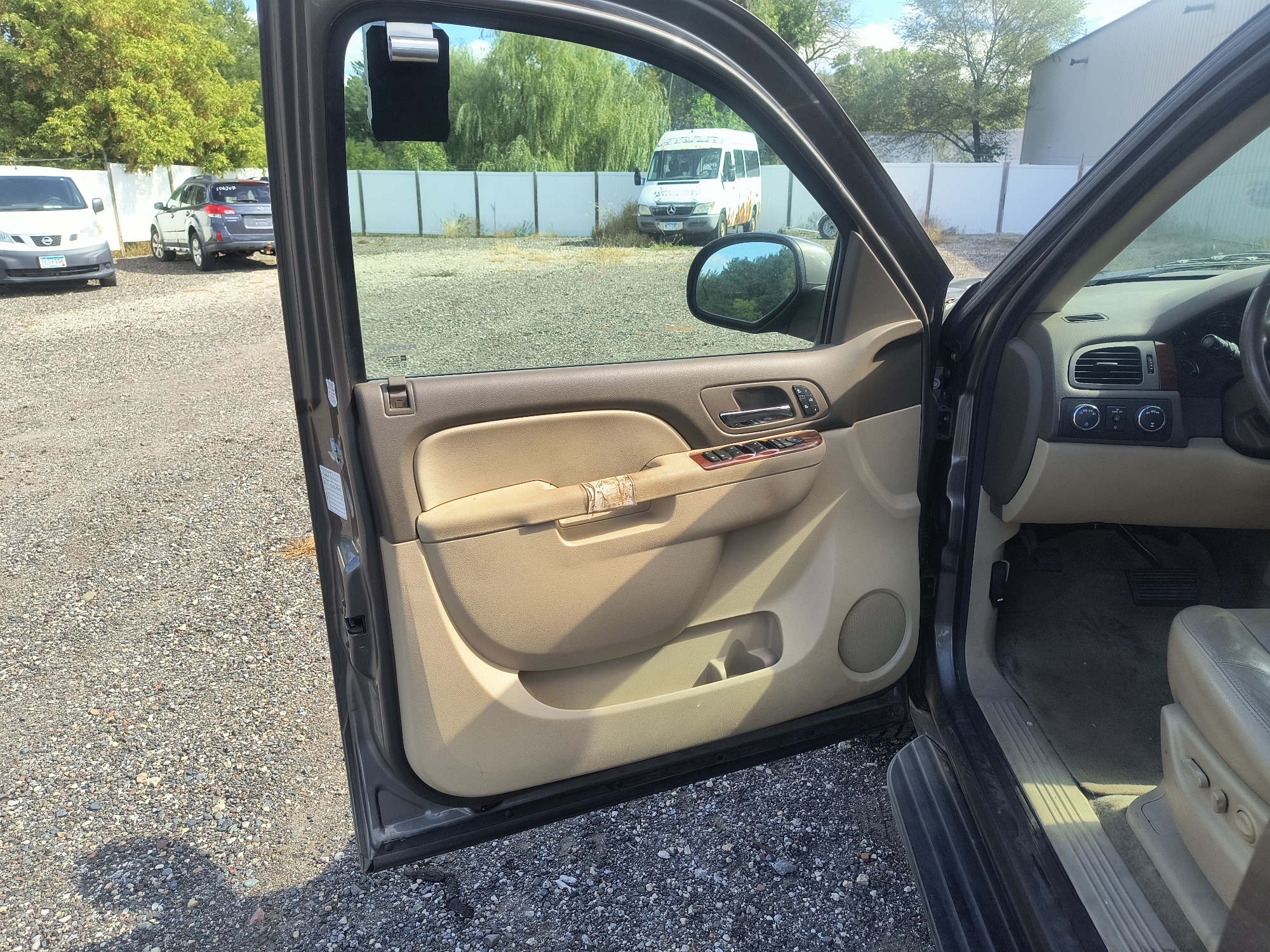 2013 chevrolet suburban ltz-1500-4wd with 215158 miles for sale near elk-river, minnesota 106563_23_driver_door_panel.jpg