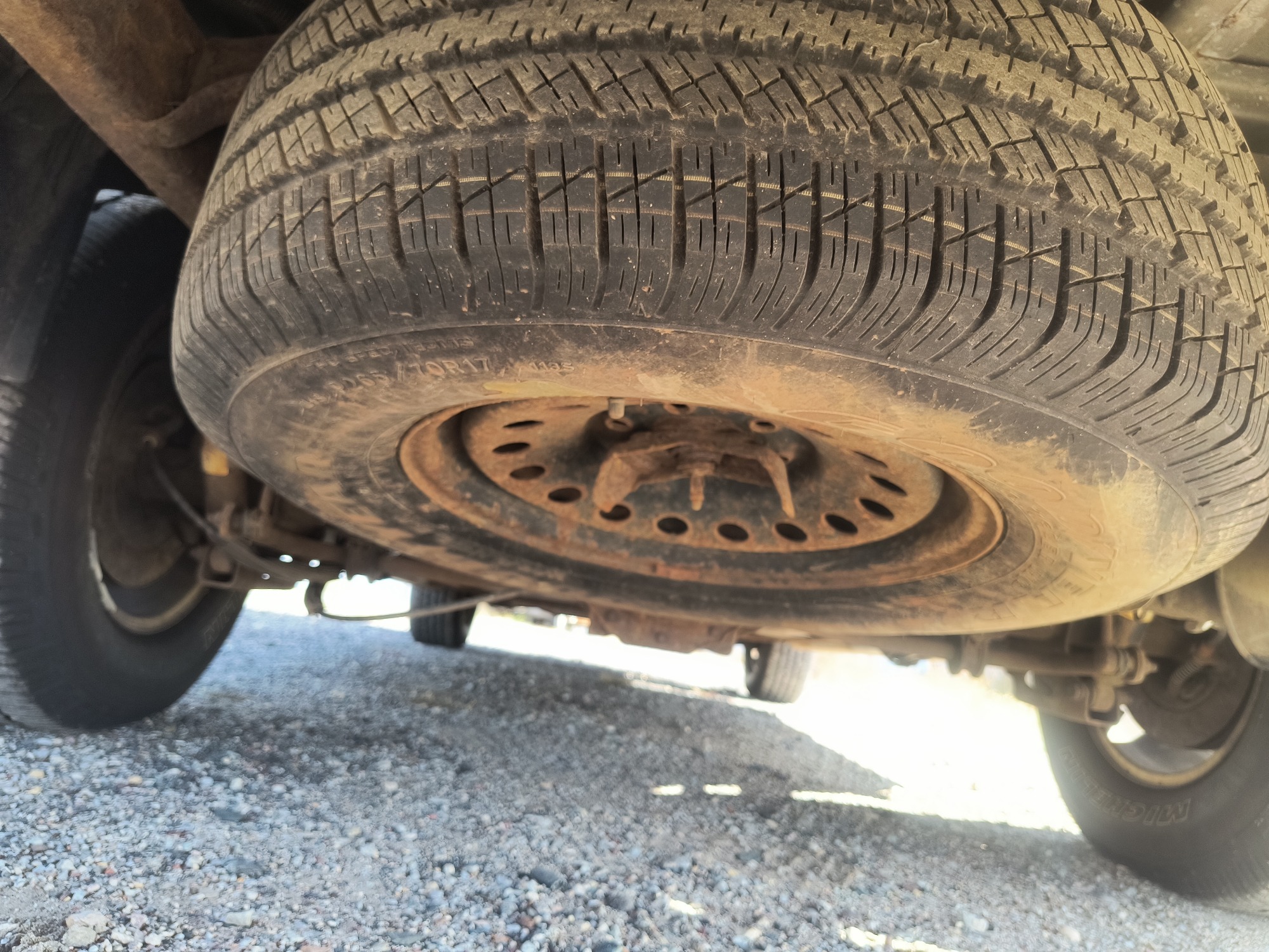 2013 chevrolet suburban ltz-1500-4wd with 215158 miles for sale near elk-river, minnesota 106563_27_spare_tire.jpg
