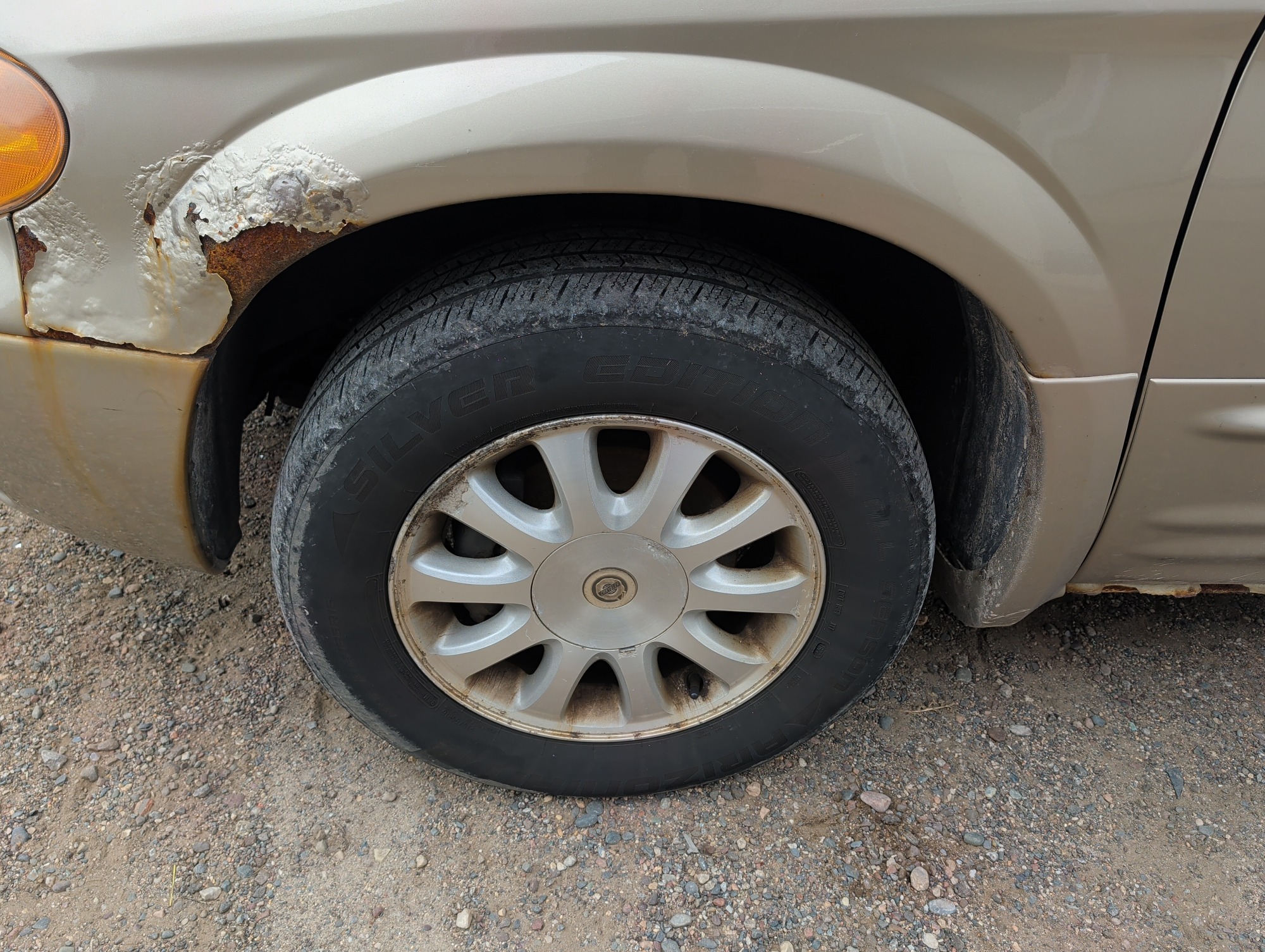 2003 chrysler town-and-country with 184015 miles for sale near elk-river, minnesota 106565_12_drv_front_wheel.jpg