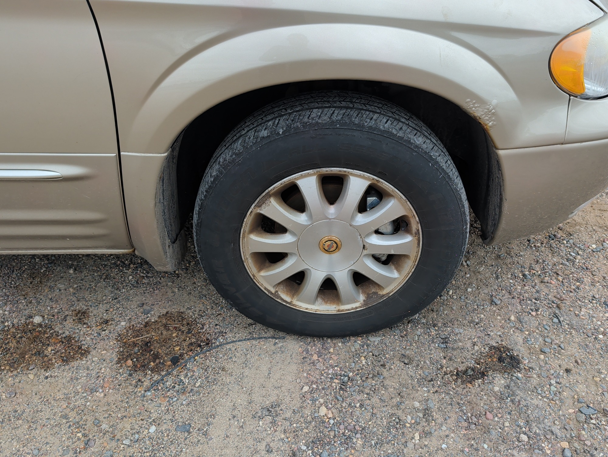 2003 chrysler town-and-country with 184015 miles for sale near elk-river, minnesota 106565_15_front_pass_wheel.jpg