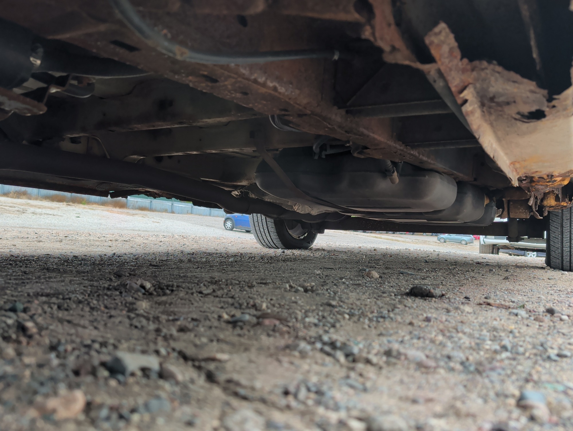 2003 chrysler town-and-country with 184015 miles for sale near elk-river, minnesota 106565_17_undercar_drv_side.jpg