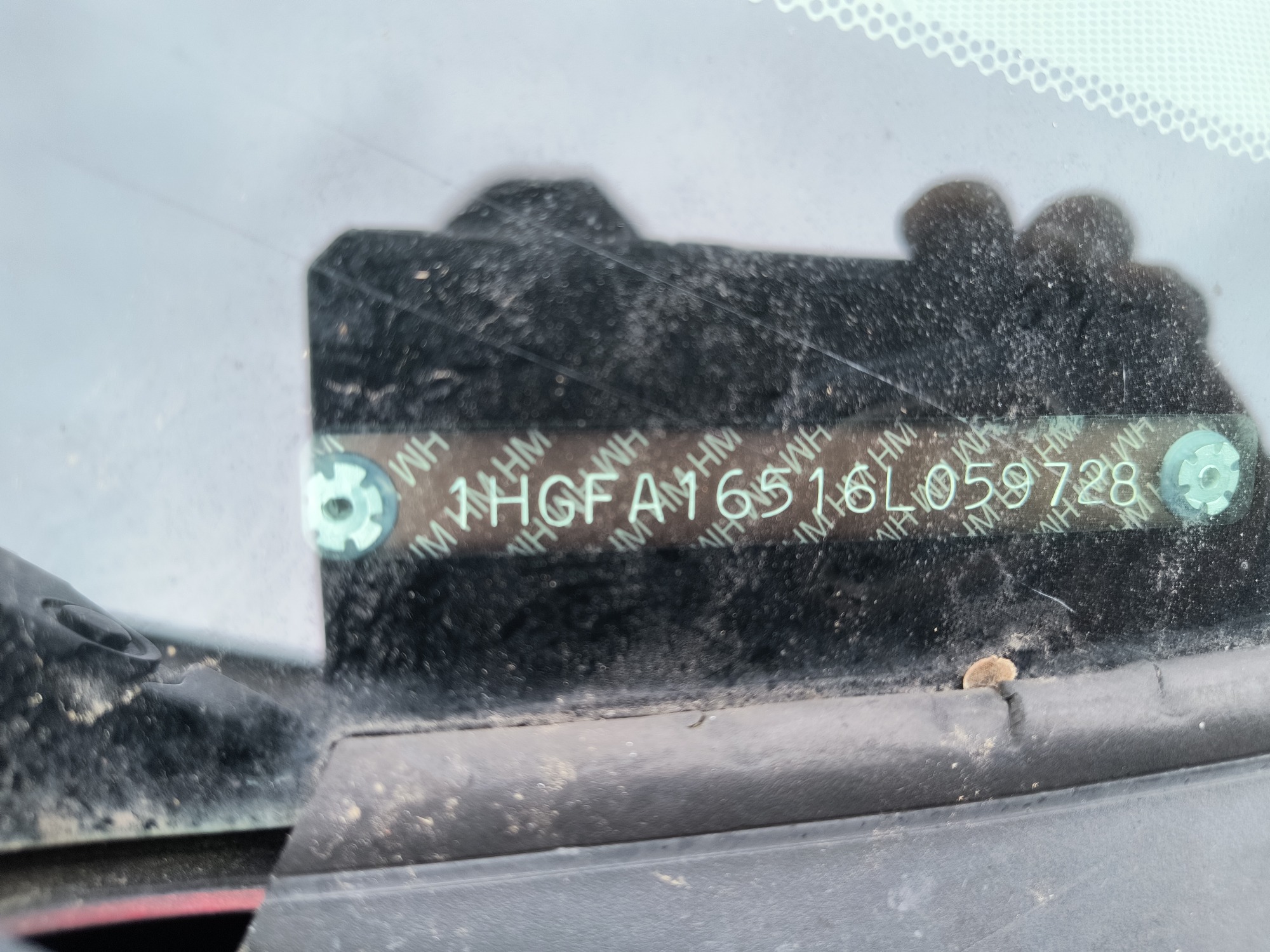 2006 honda civic lx-sedan-at with 229409 miles for sale near Elk River, Minnesota 106574_48_windshield_vin_plate.jpg