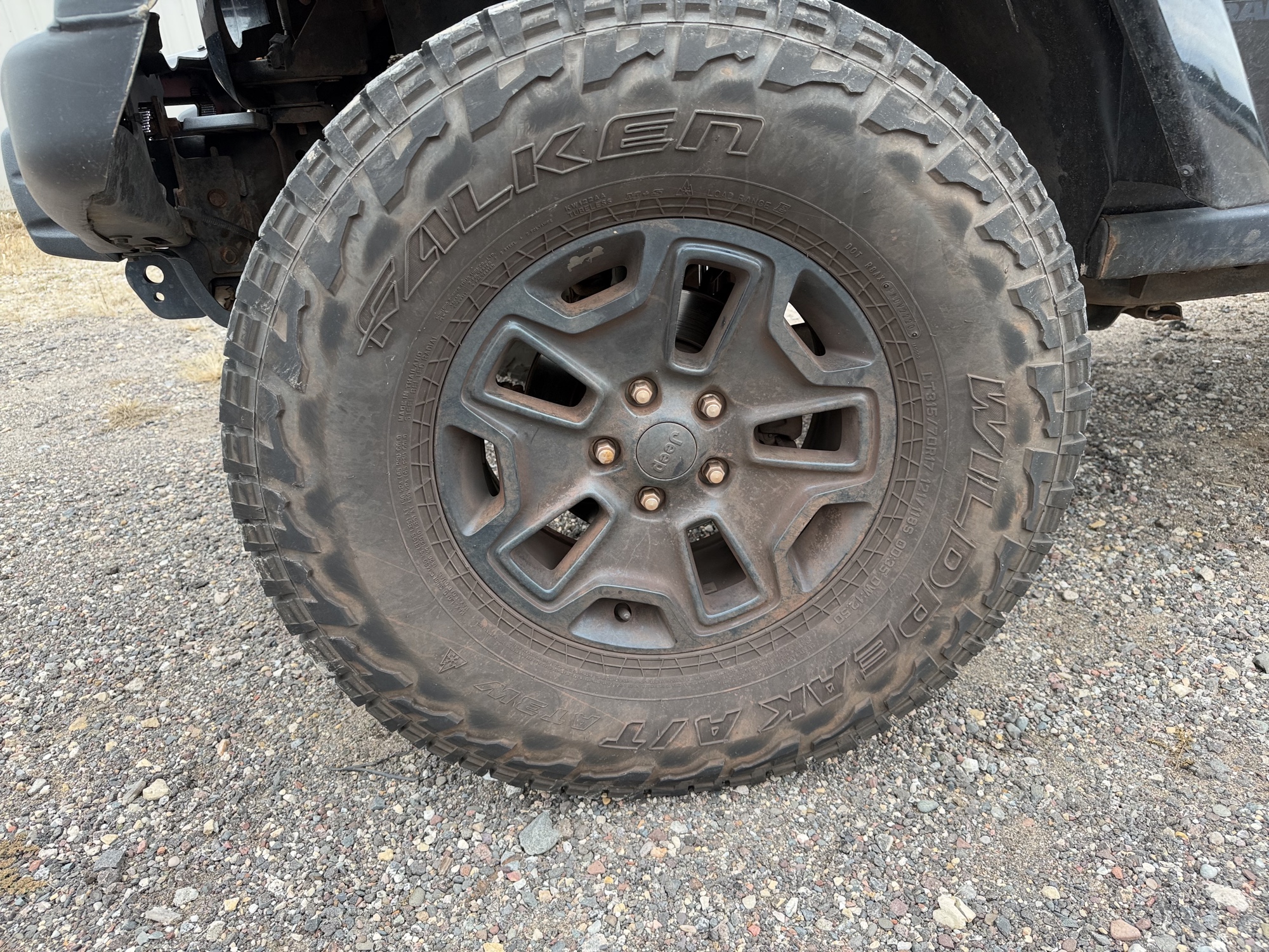 2016 jeep wrangler unlimited-sahara-4wd with 91724 miles for sale near Elk River, Minnesota 106578_12_drv_front_wheel.jpg