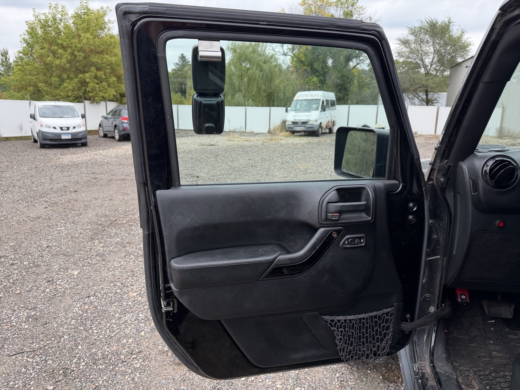 2016 jeep wrangler unlimited-sahara-4wd with 91724 miles for sale near Elk River, Minnesota 106578_23_driver_door_panel.jpg