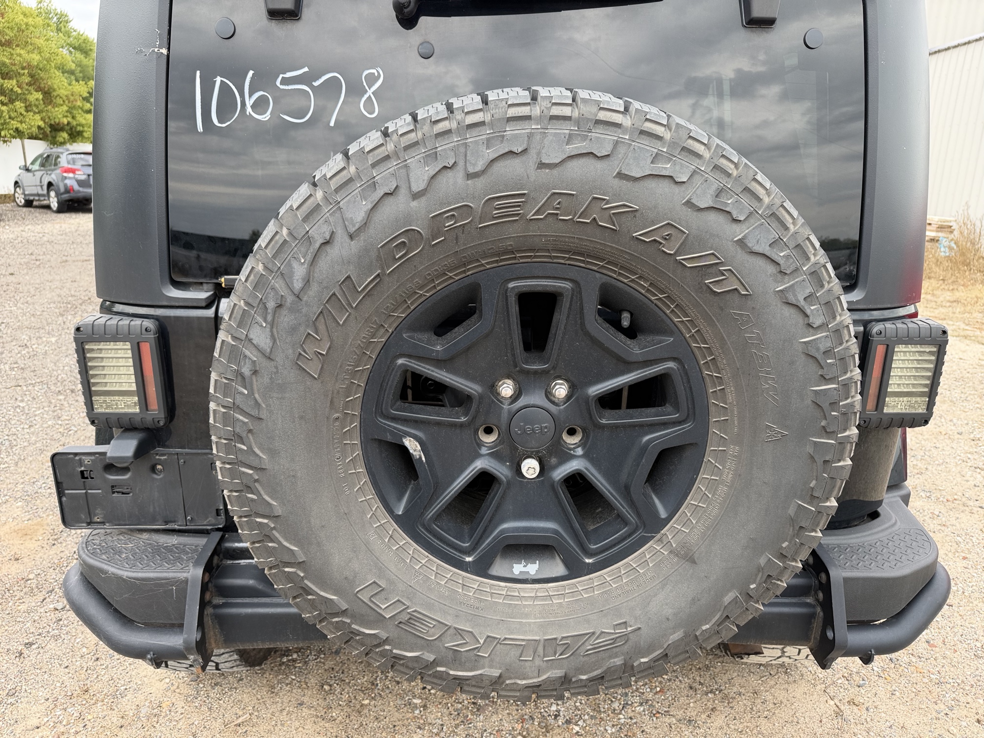 2016 jeep wrangler unlimited-sahara-4wd with 91724 miles for sale near Elk River, Minnesota 106578_27_spare_tire.jpg