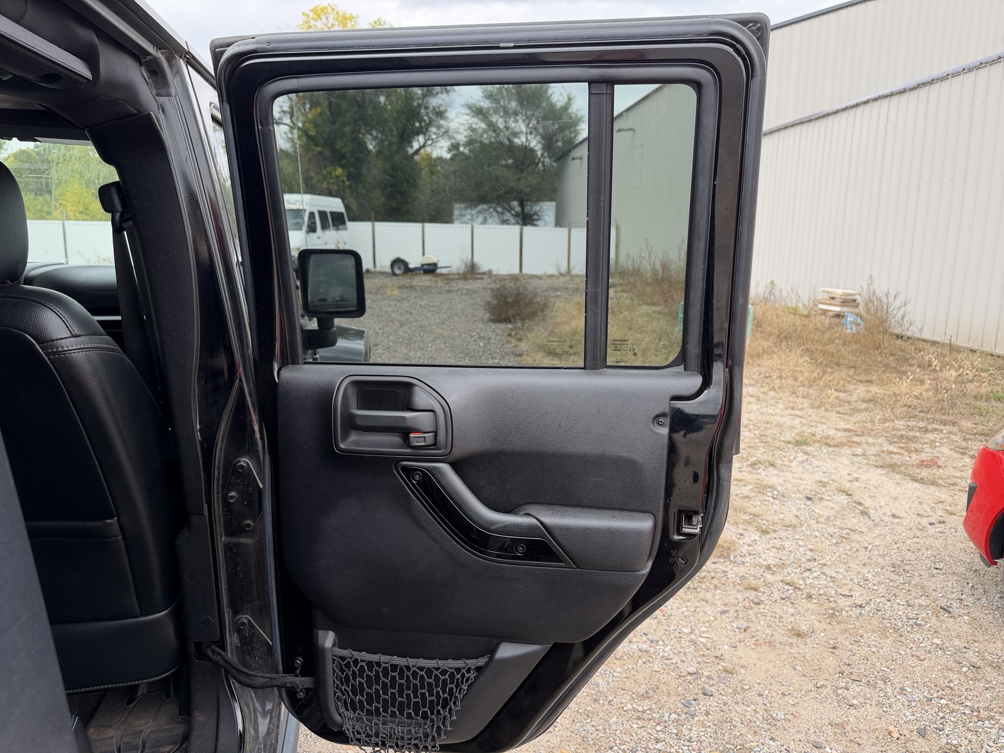 2016 jeep wrangler unlimited-sahara-4wd with 91724 miles for sale near Elk River, Minnesota 106578_30_pass_rear_door_panel.jpg