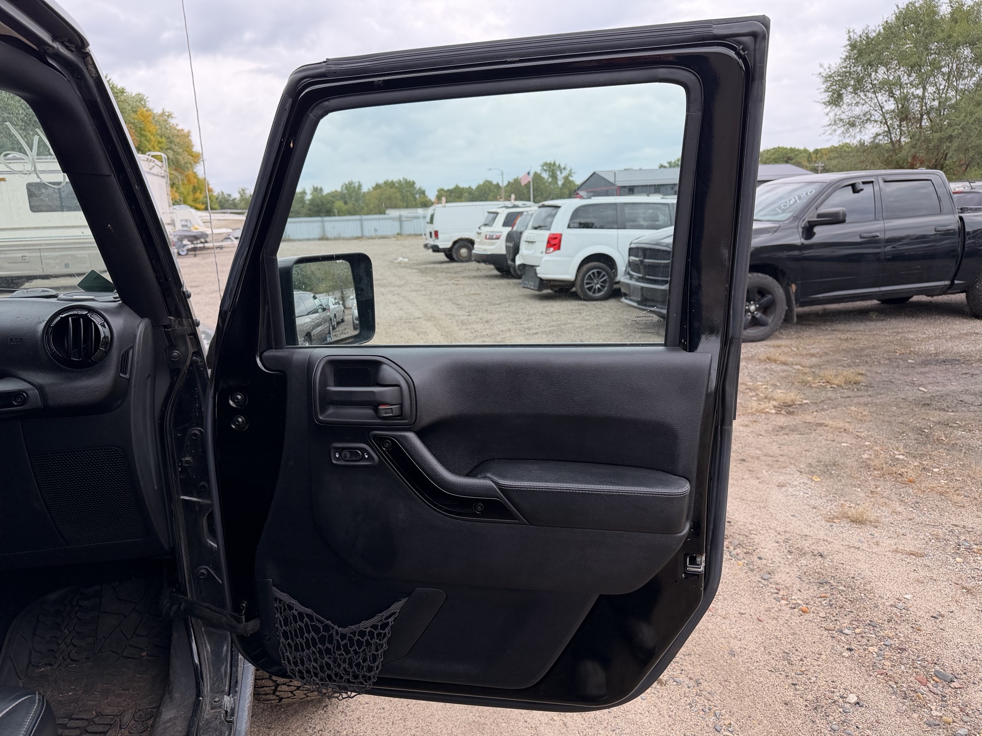 2016 jeep wrangler unlimited-sahara-4wd with 91724 miles for sale near Elk River, Minnesota 106578_32_passenger_door_panel.jpg