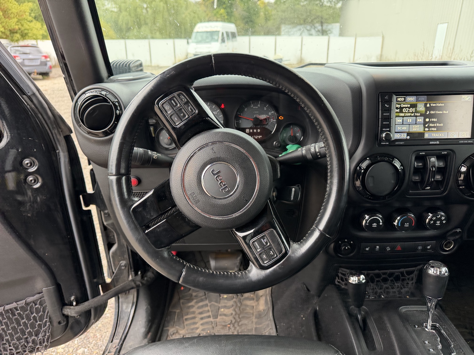 2016 jeep wrangler unlimited-sahara-4wd with 91724 miles for sale near Elk River, Minnesota 106578_33_dash_from_driver.jpg