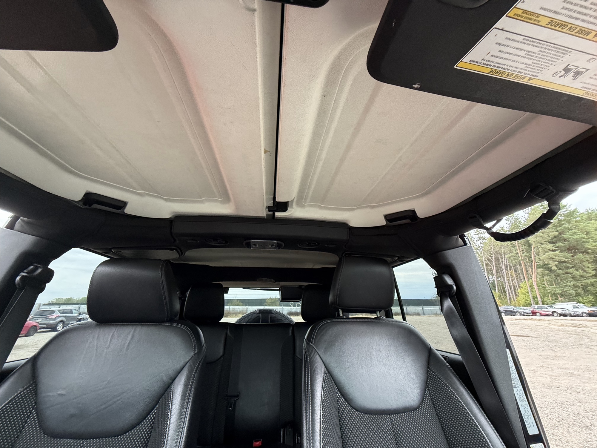 2016 jeep wrangler unlimited-sahara-4wd with 91724 miles for sale near Elk River, Minnesota 106578_35_headliner_sunroof.jpg