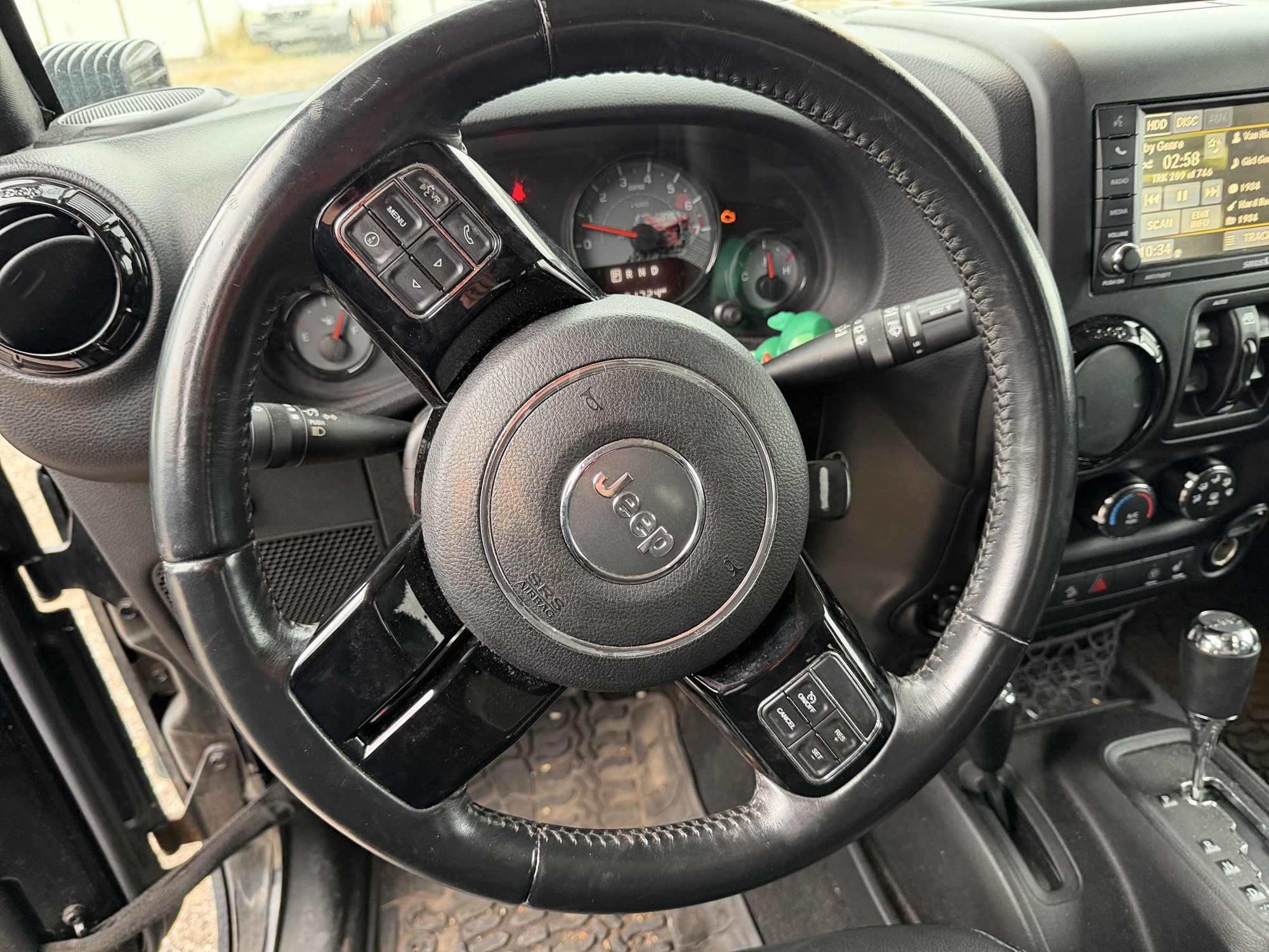 2016 jeep wrangler unlimited-sahara-4wd with 91724 miles for sale near Elk River, Minnesota 106578_36_steering_wheel.jpg