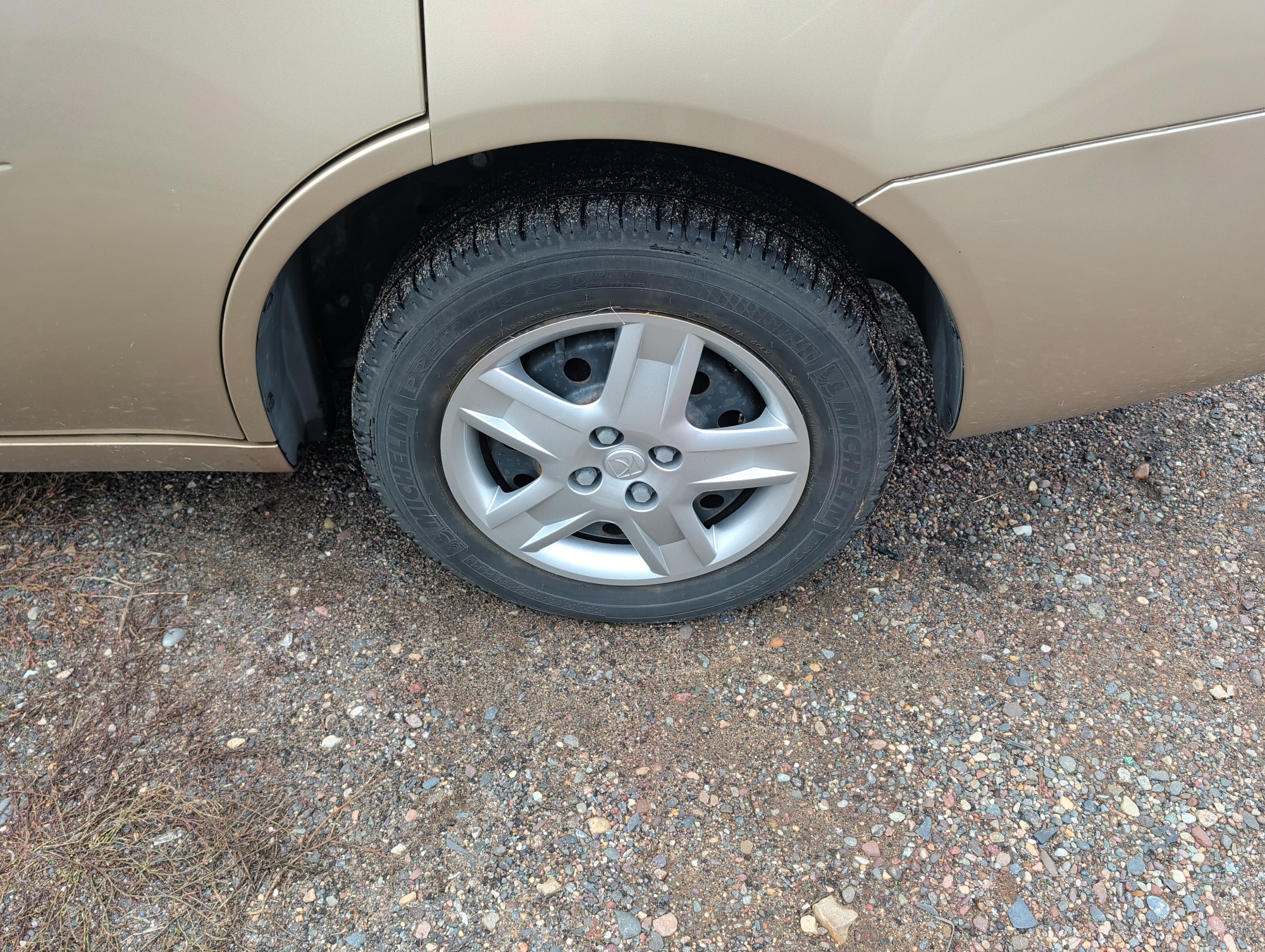 2006 saturn ion with 93338 miles for sale near Elk River, Minnesota 106579_13_rear_drv_wheel.jpg
