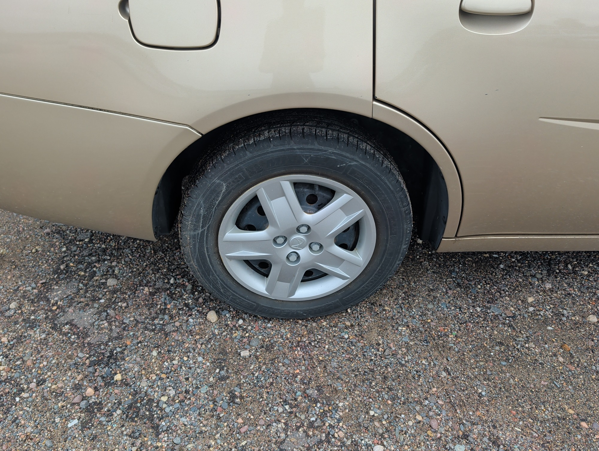 2006 saturn ion with 93338 miles for sale near Elk River, Minnesota 106579_14_rear_pass_wheel.jpg