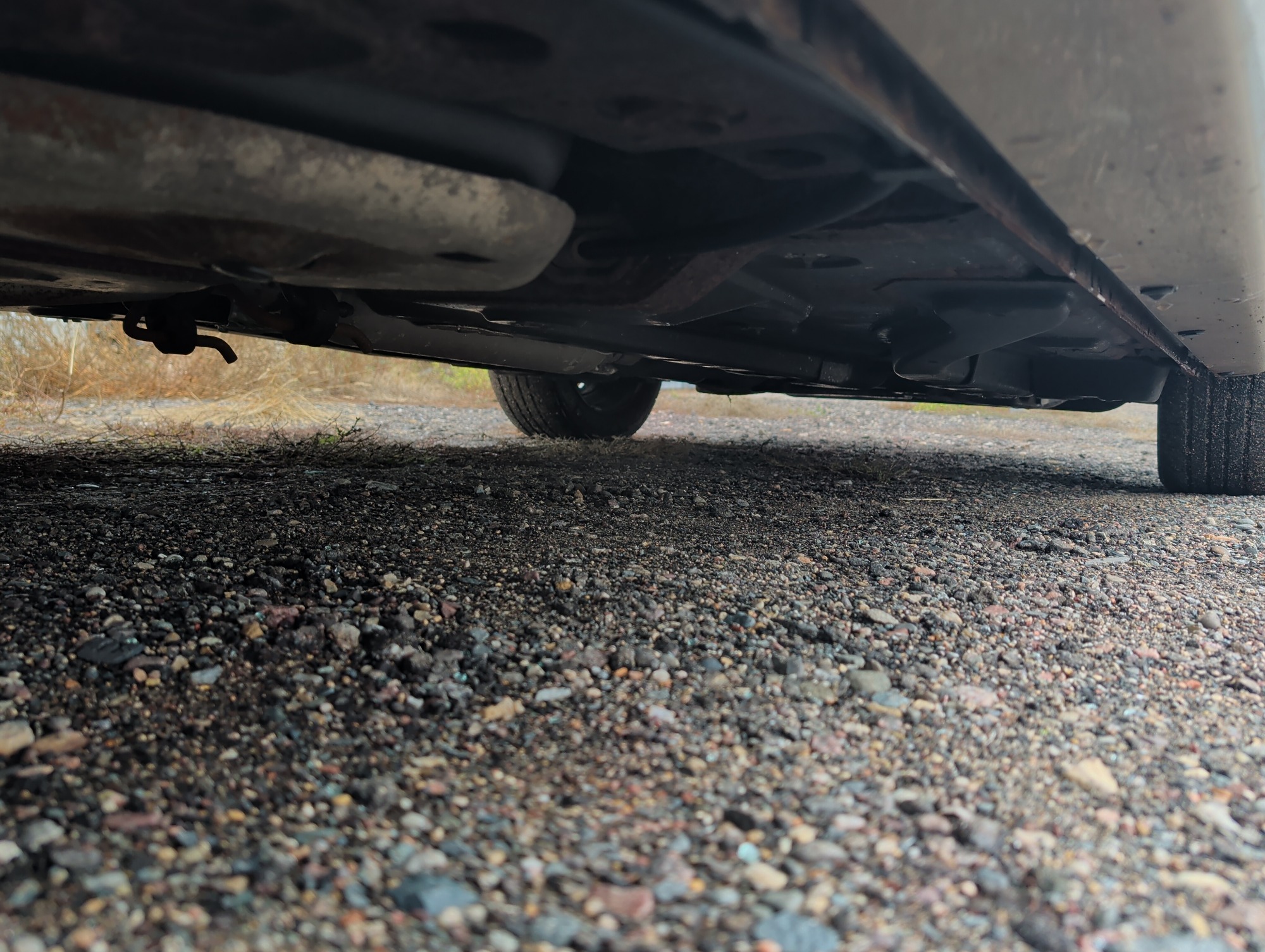 2006 saturn ion with 93338 miles for sale near Elk River, Minnesota 106579_20_undercar_rear_pass.jpg
