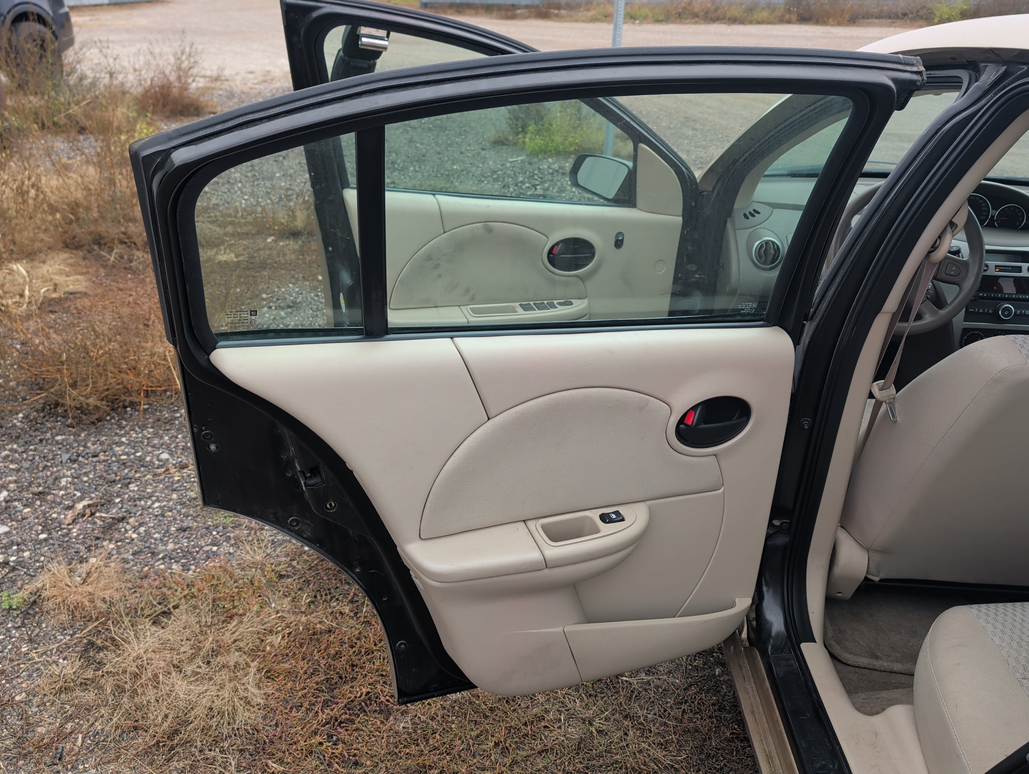 2006 saturn ion with 93338 miles for sale near Elk River, Minnesota 106579_25_drv_rear_door_panel.jpg