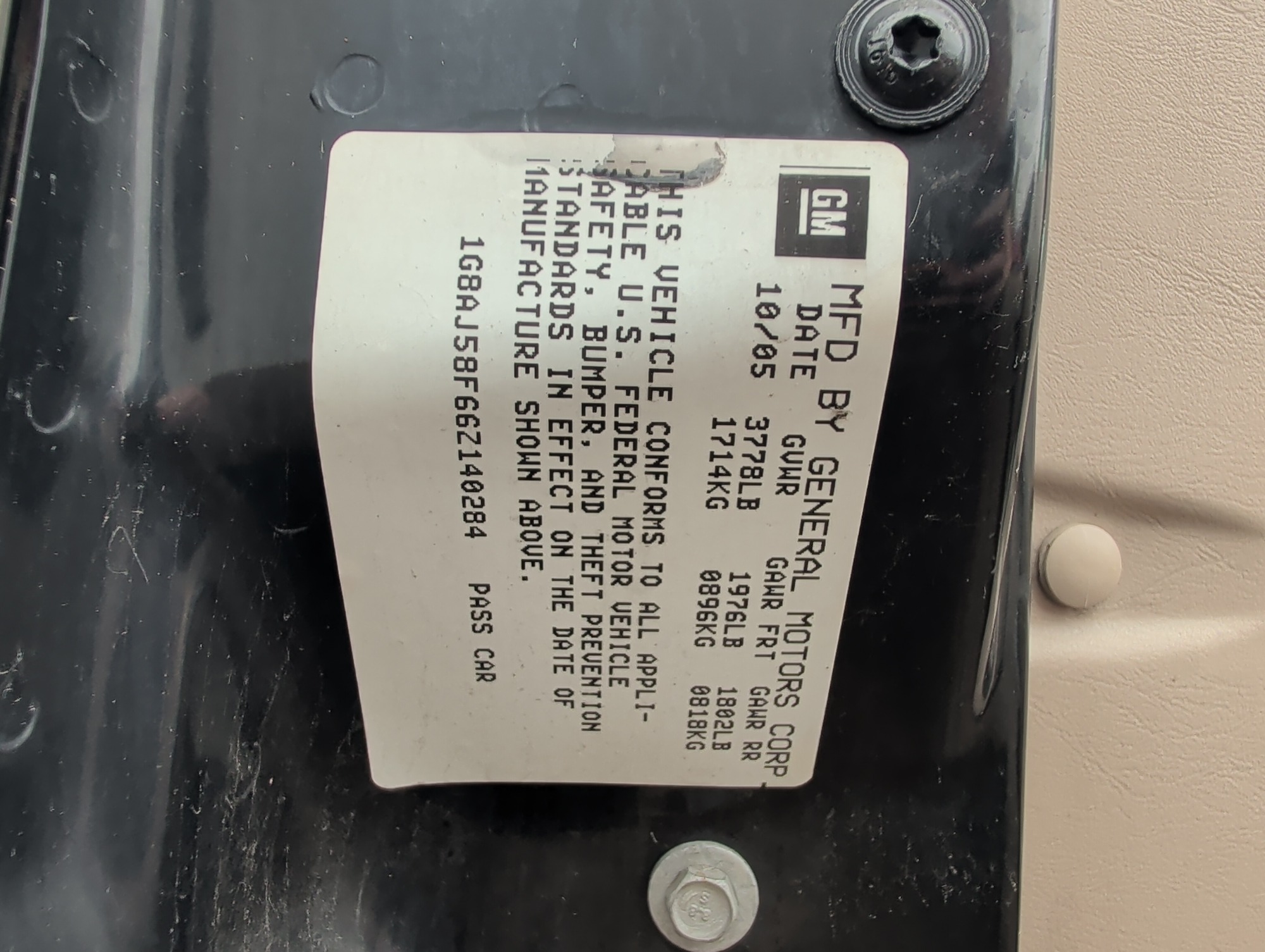 2006 saturn ion with 93338 miles for sale near Elk River, Minnesota 106579_47_door_vin_sticker.jpg