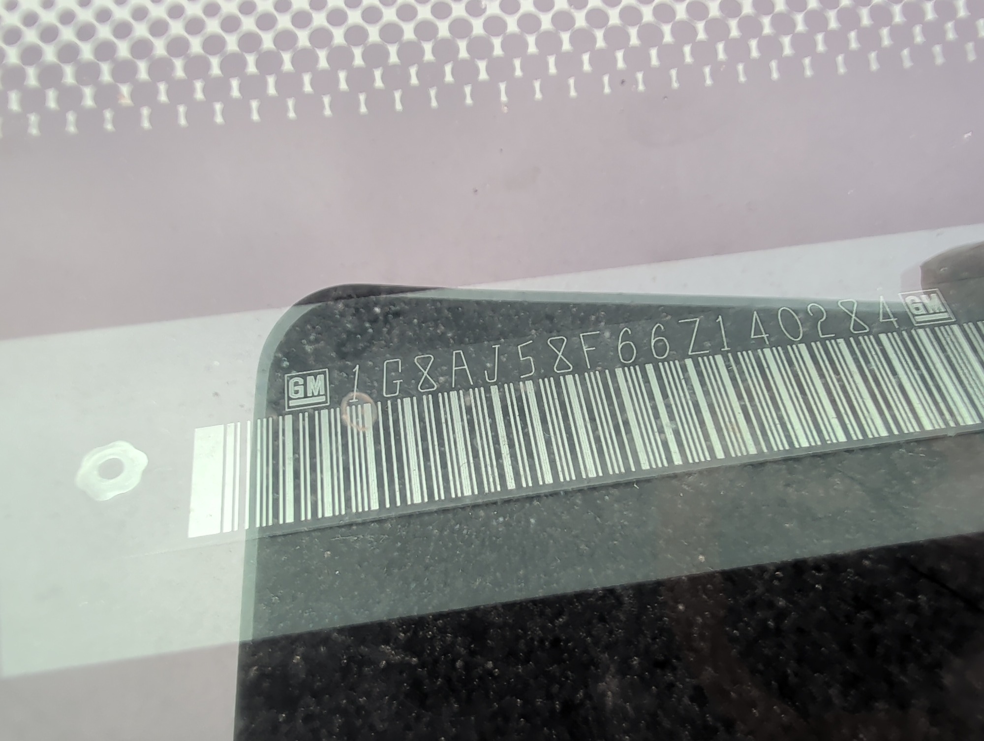 2006 saturn ion with 93338 miles for sale near Elk River, Minnesota 106579_48_windshield_vin_plate.jpg