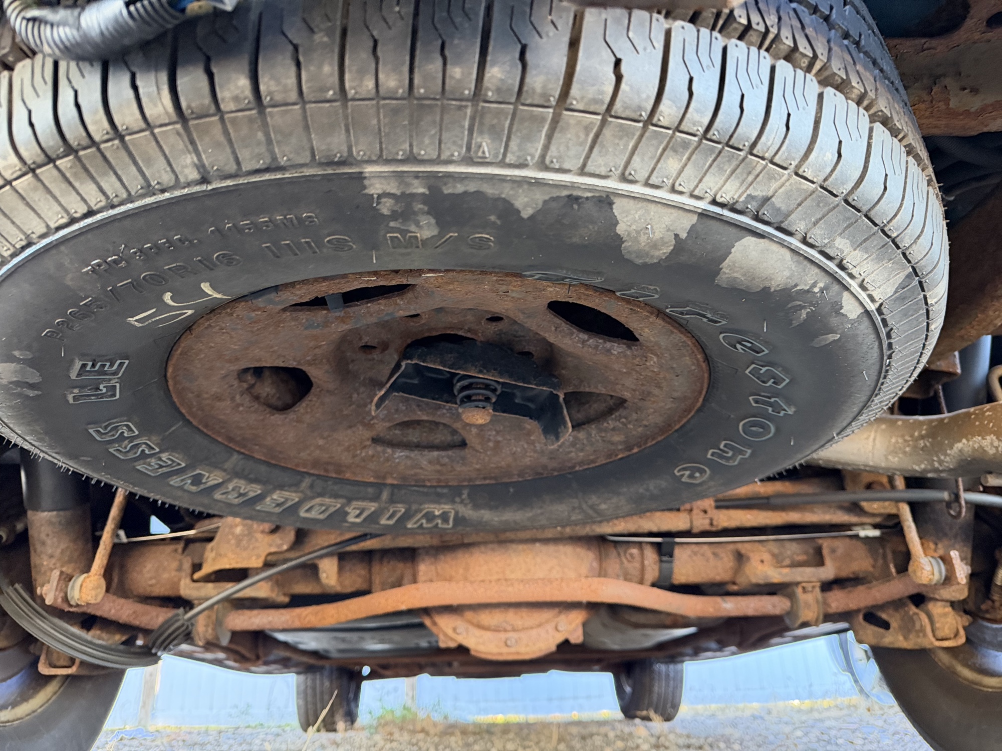 2003 chevrolet tahoe 4wd with 168168 miles for sale near Elk River, Minnesota 106589_27_spare_tire.jpg
