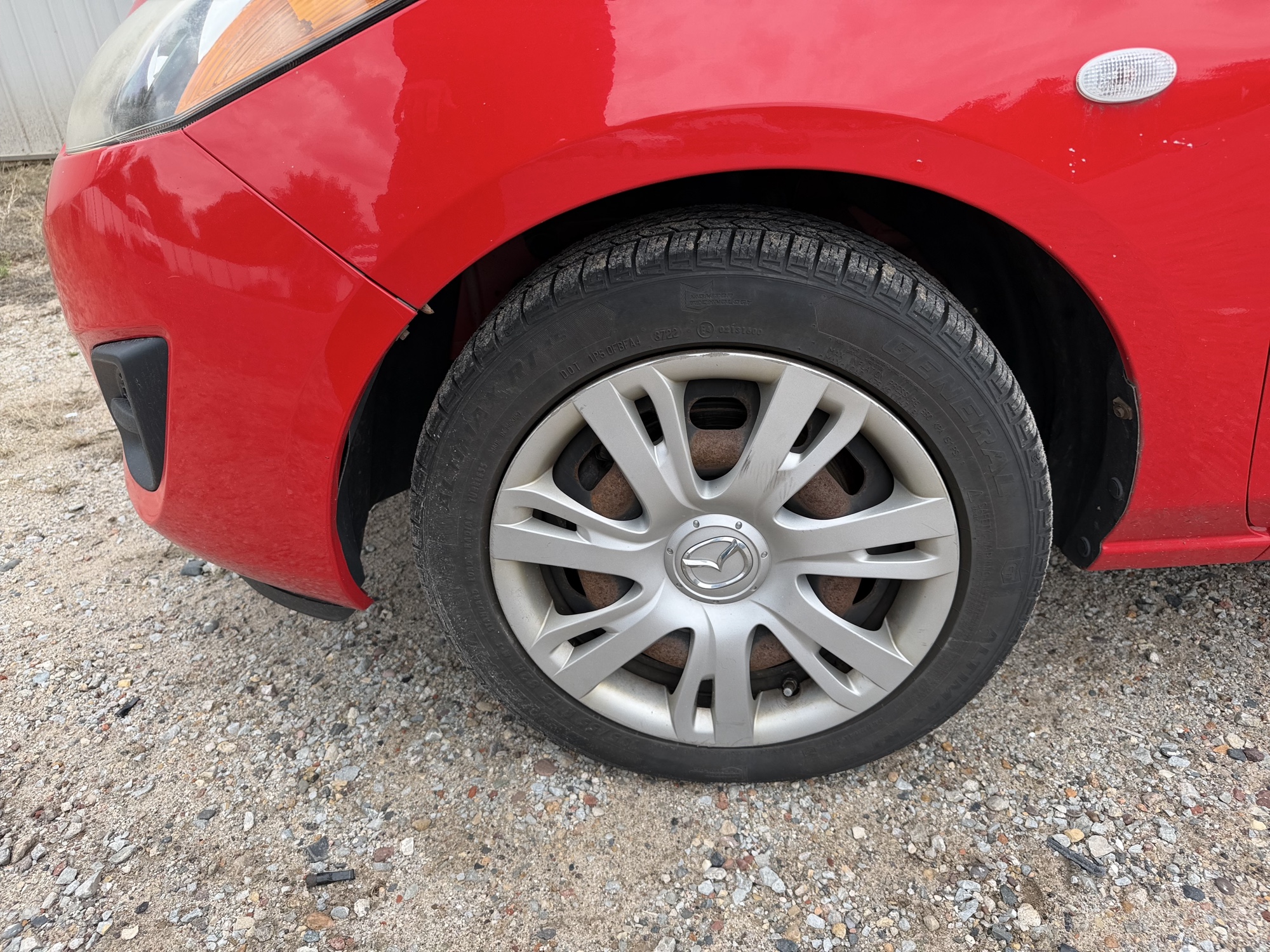 2013 mazda mazda2 sport with 211727 miles for sale near Elk River, Minnesota 106595_12_drv_front_wheel.jpg